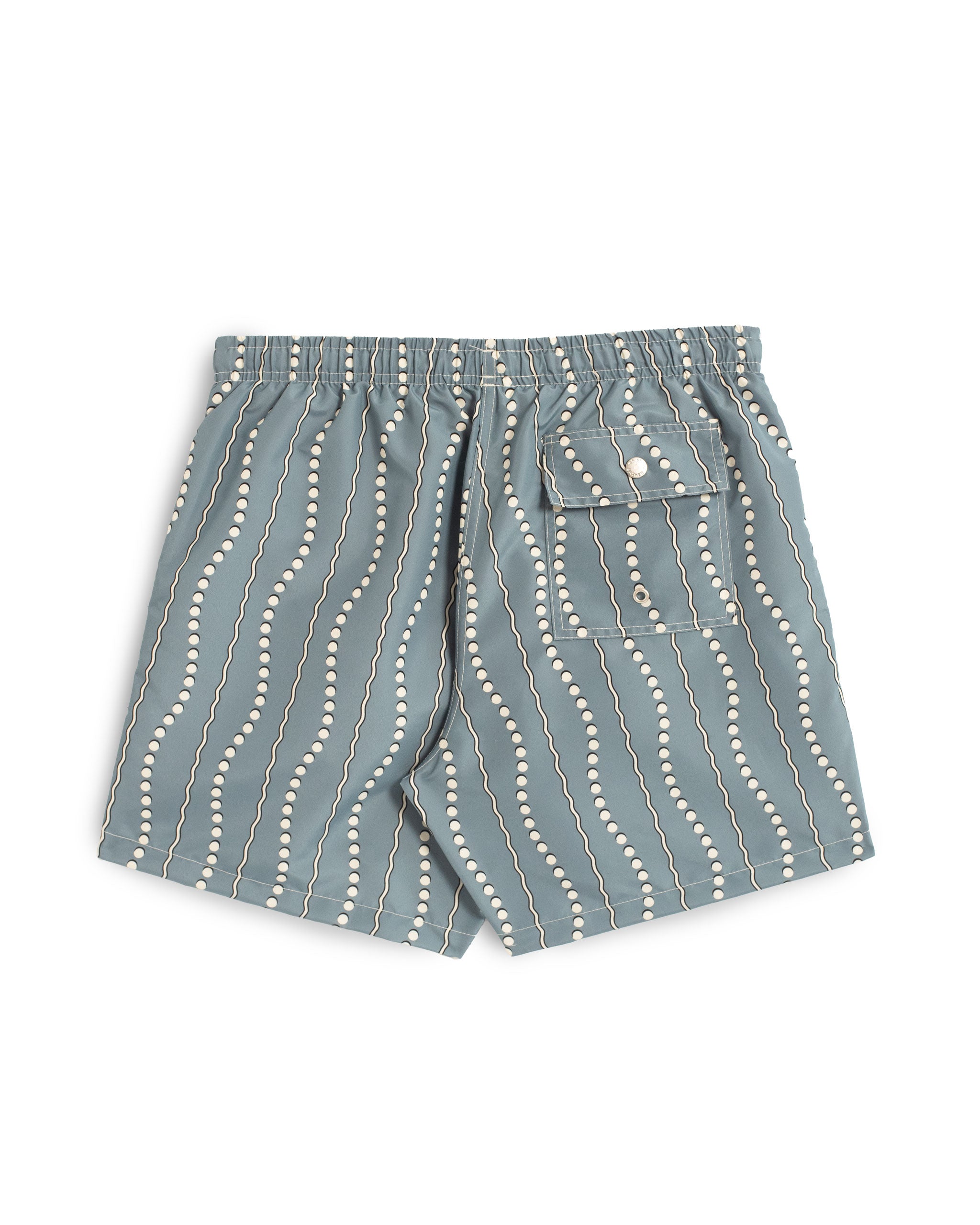 Men's blue swim trunks with white dot and wavy stripe pattern back view with button closure pocket