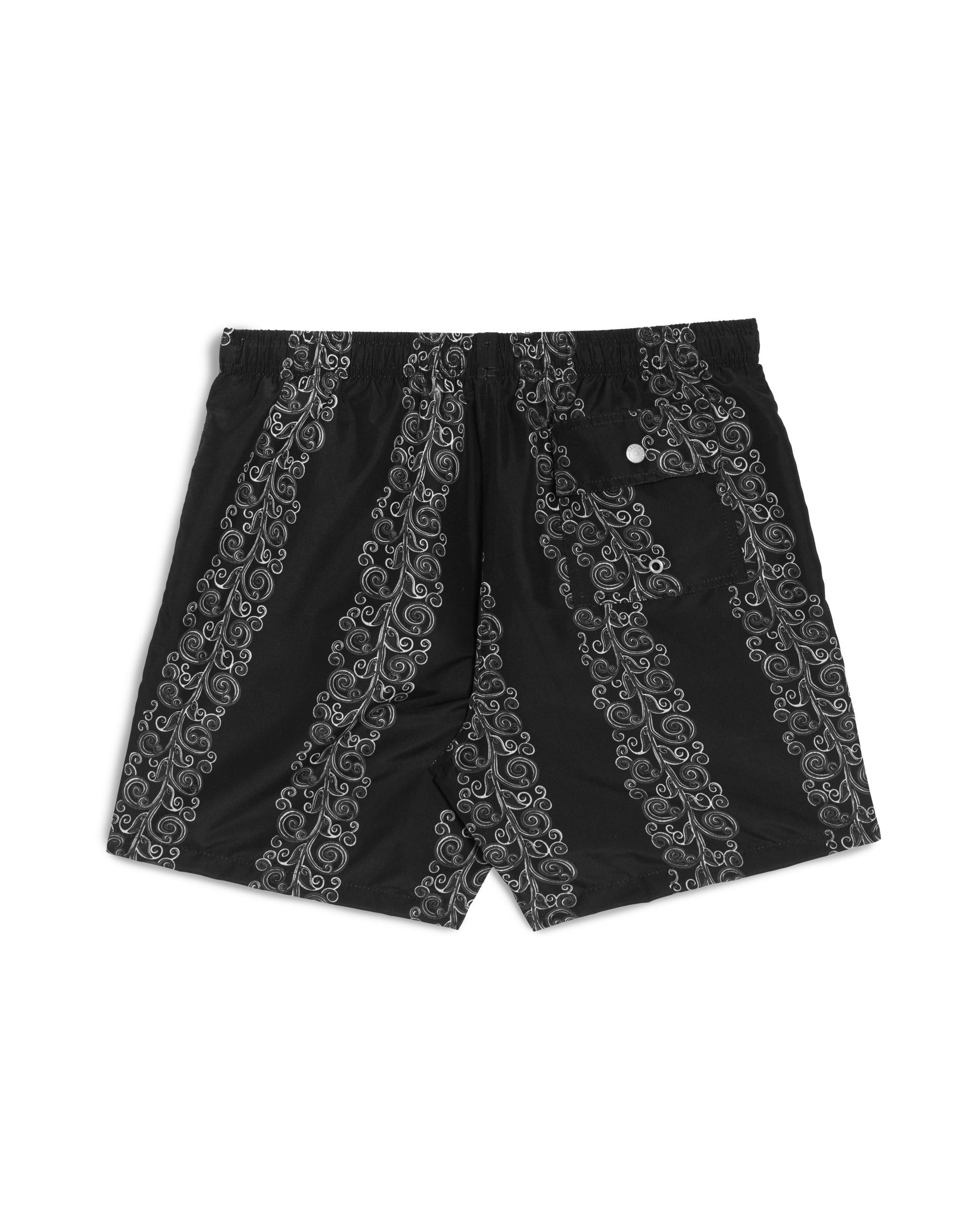 Rear view of men’s black swim trunks with grey floral stripe pattern and a back button-closure pocket