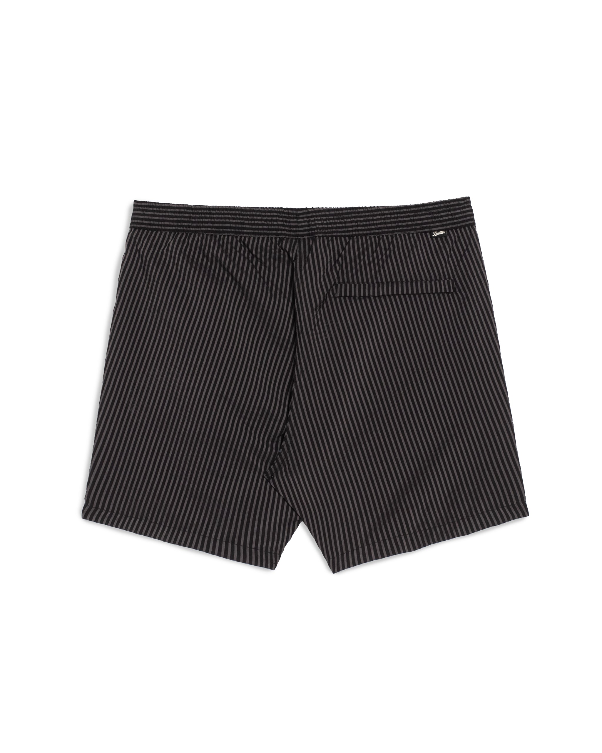 Back-view of men’s black pinstripe swim trunk with hidden zipper closure pocket