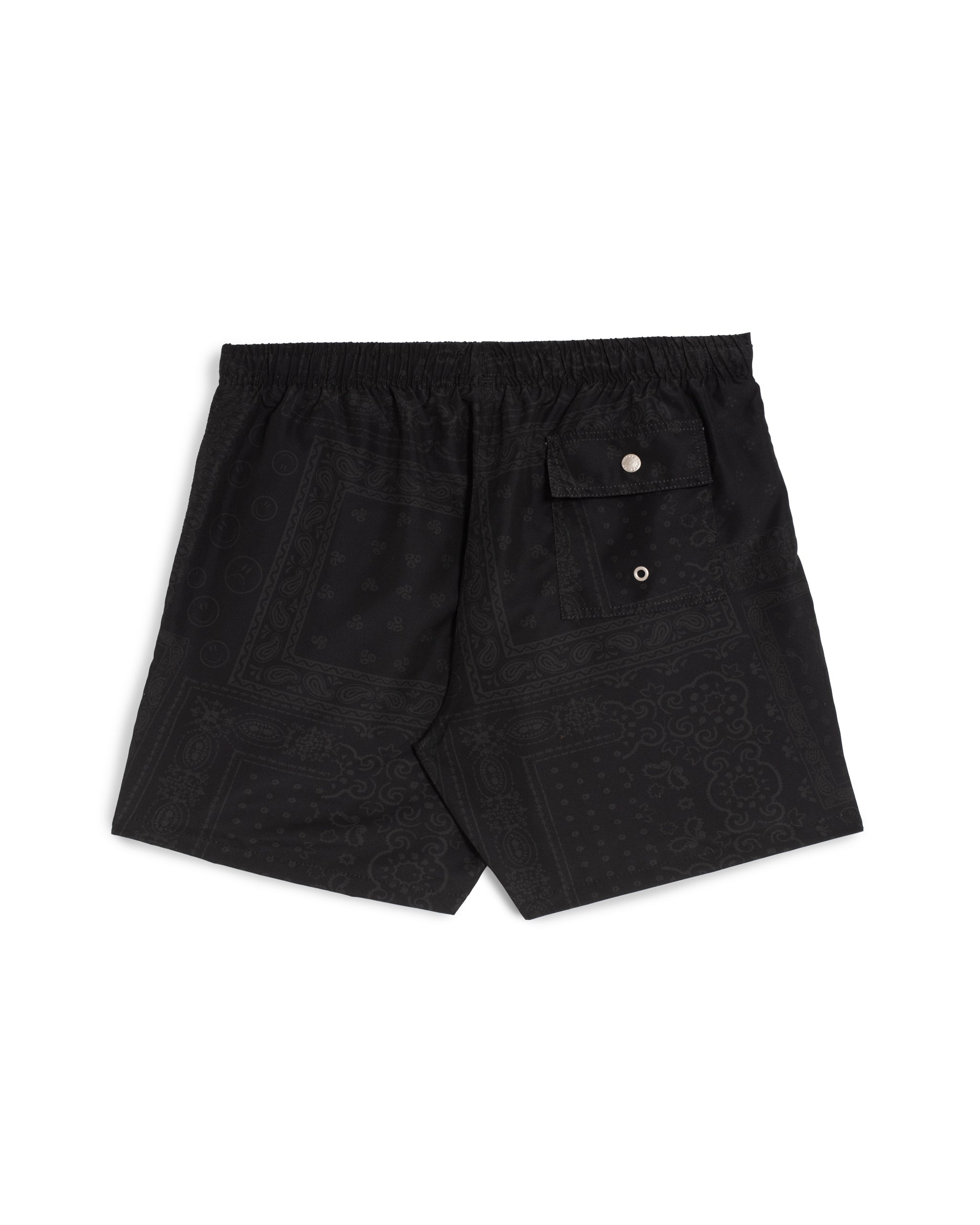 Rear view of men’s black swim trunks with bandana pattern and back button-closure pocket
