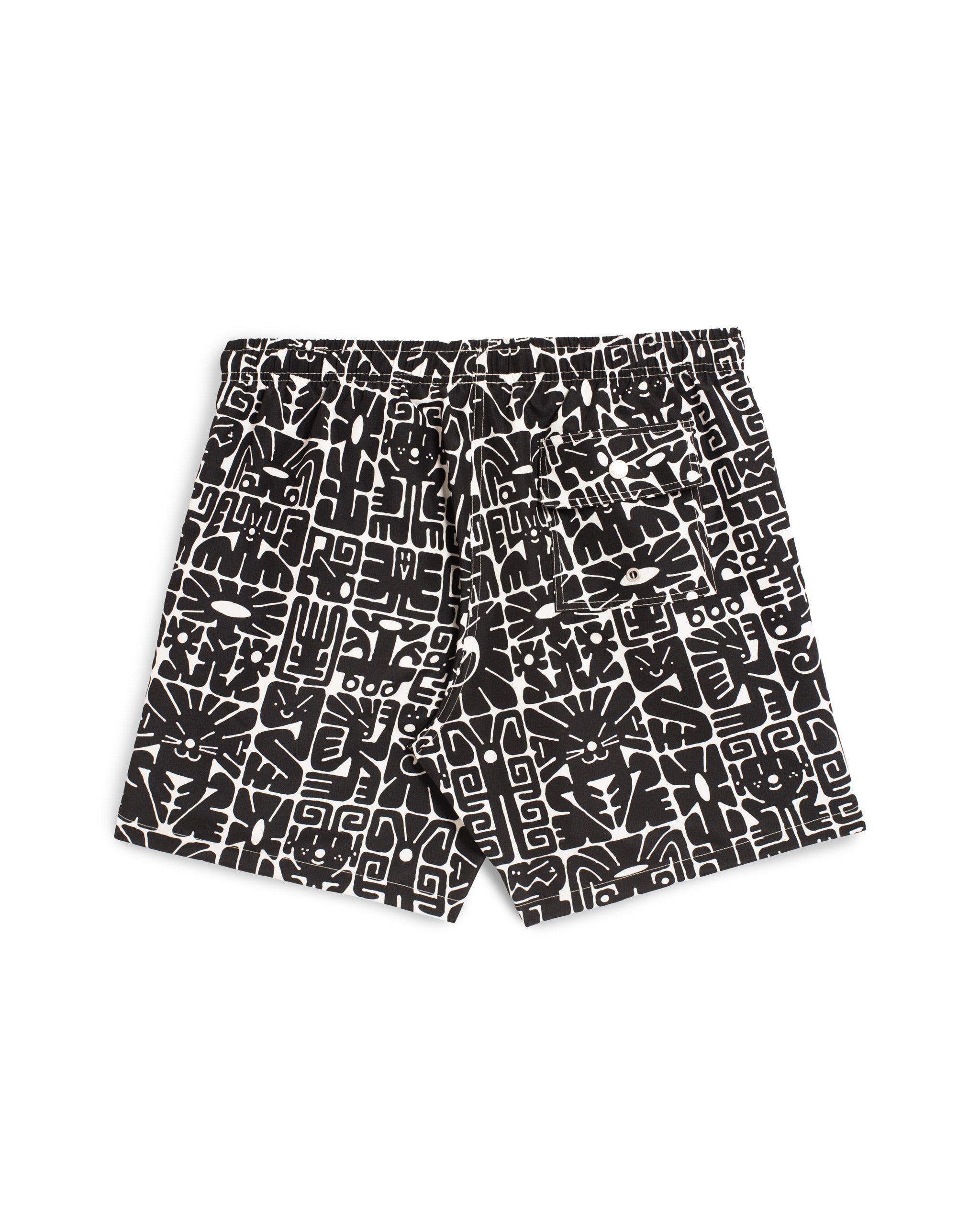 Rear view of men’s black and white geometric-print swim trunks with back button-closure pocket