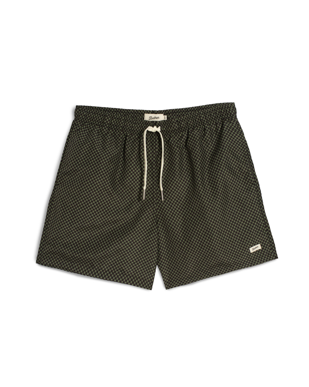 A pair of dark olive green swim trunks with a small white geometric pattern, featuring a white drawstring and a small white brand tag on the lower left leg, displayed against a plain white background.