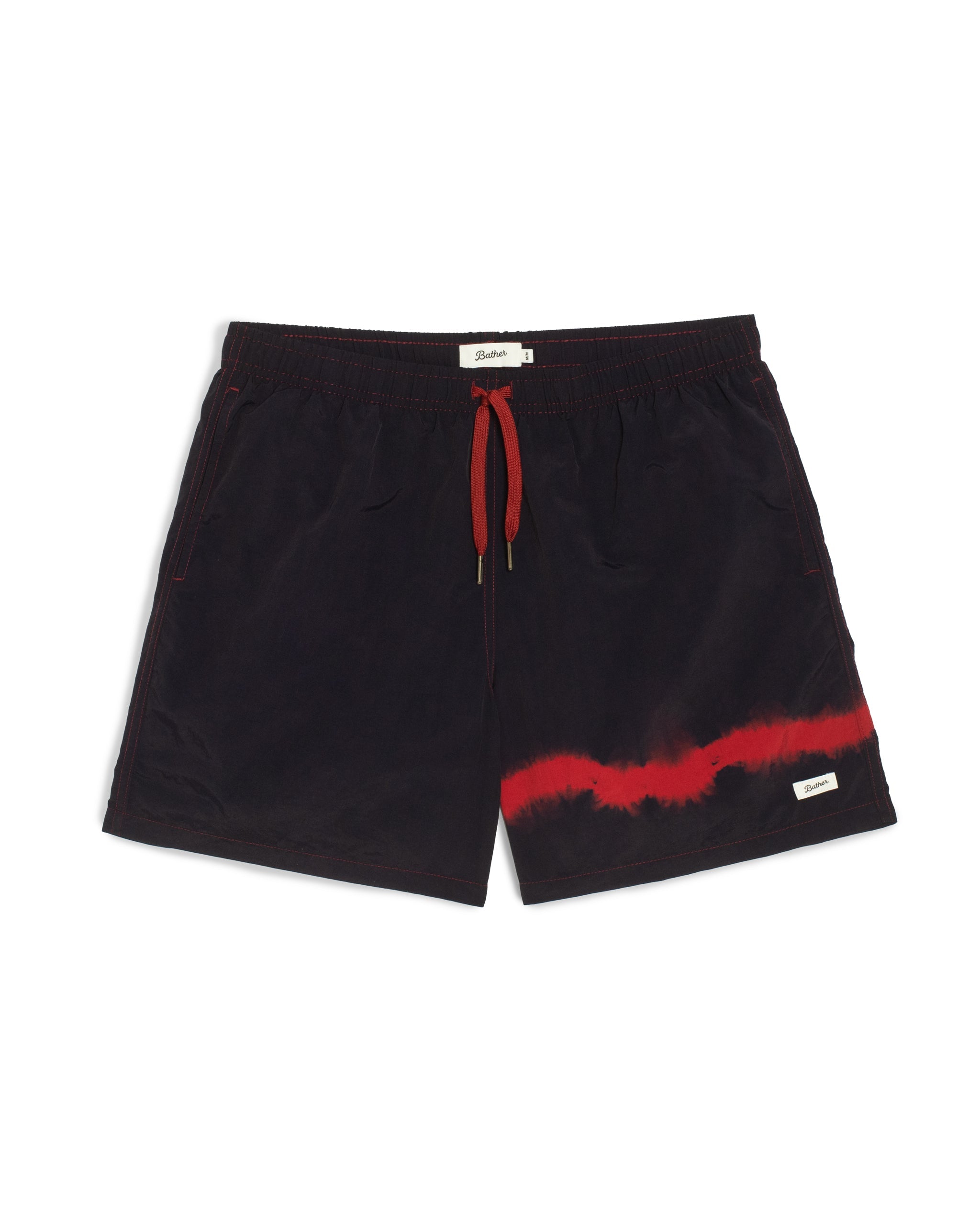 Black shorts with red accents on a white background