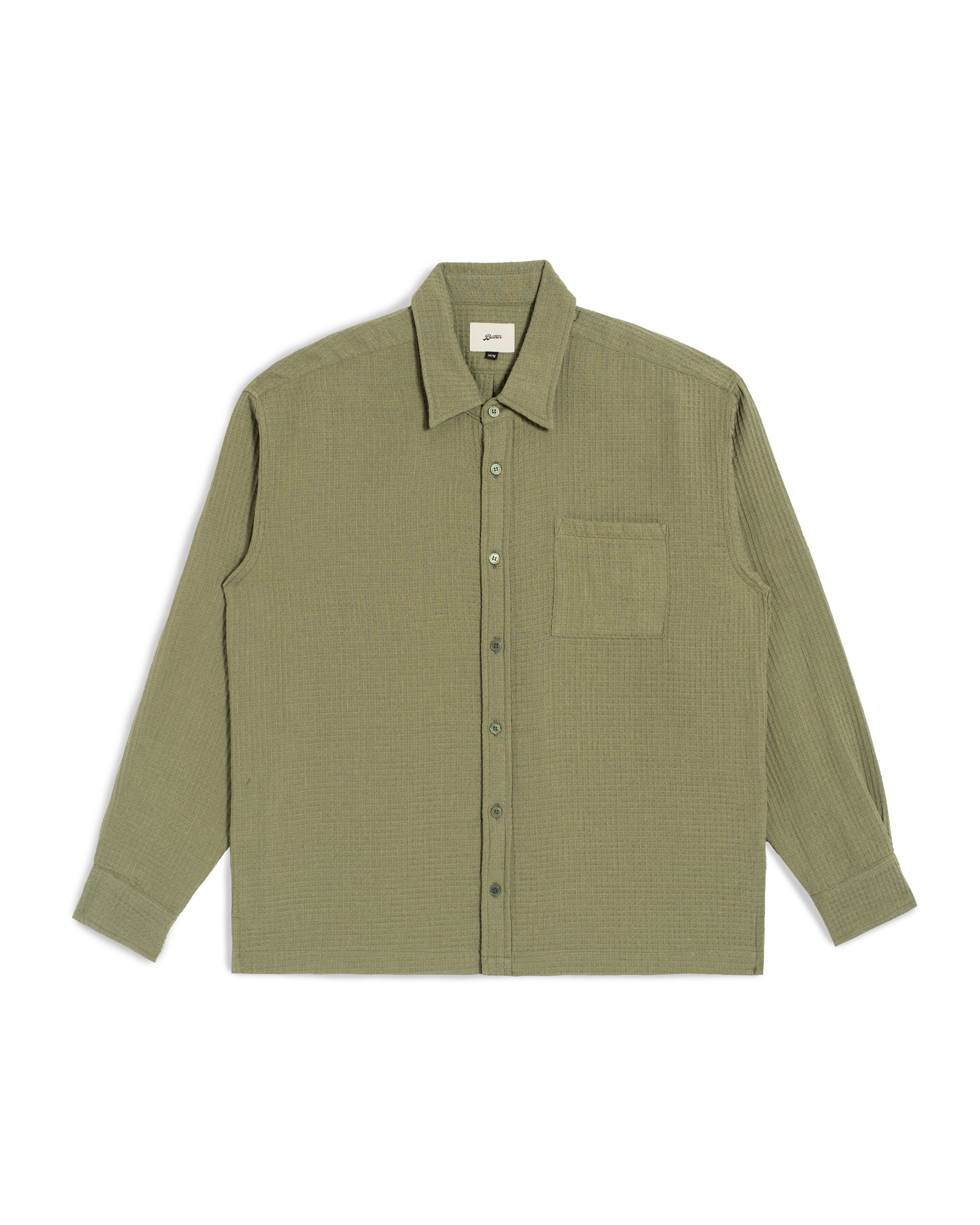 Front view of the Bather Men's Artichoke Waffle Leisure Shirt, featuring a textured olive green cotton-linen waffle weave, an oversized fit, and a full tonal button placket against a white background.