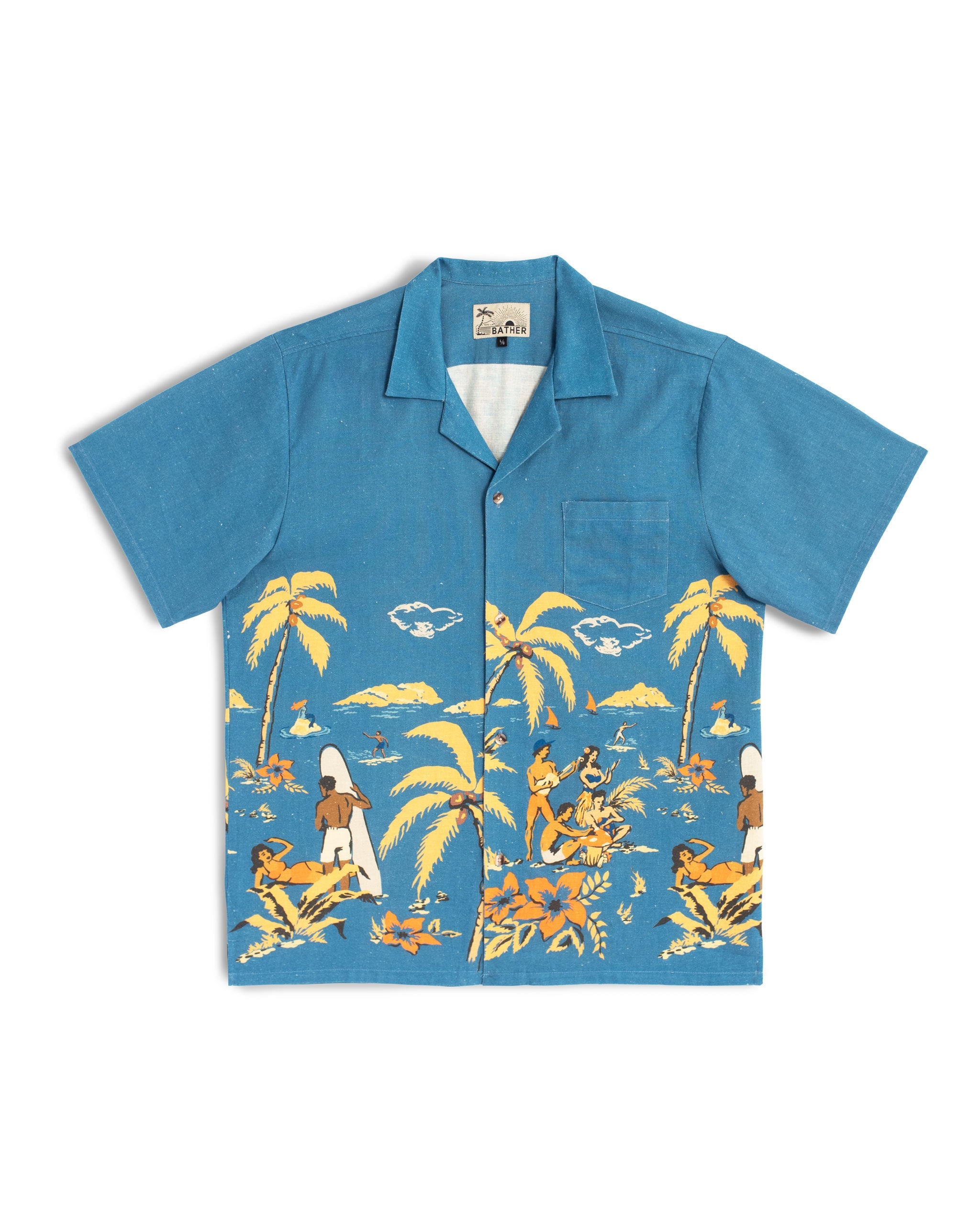 Front view of the Bather Men's Baltic Trippin' Beach Camp Shirt, featuring a blue linen fabric with a retro Polynesian-inspired beach scene print, a chest pocket, and a classic camp collar.