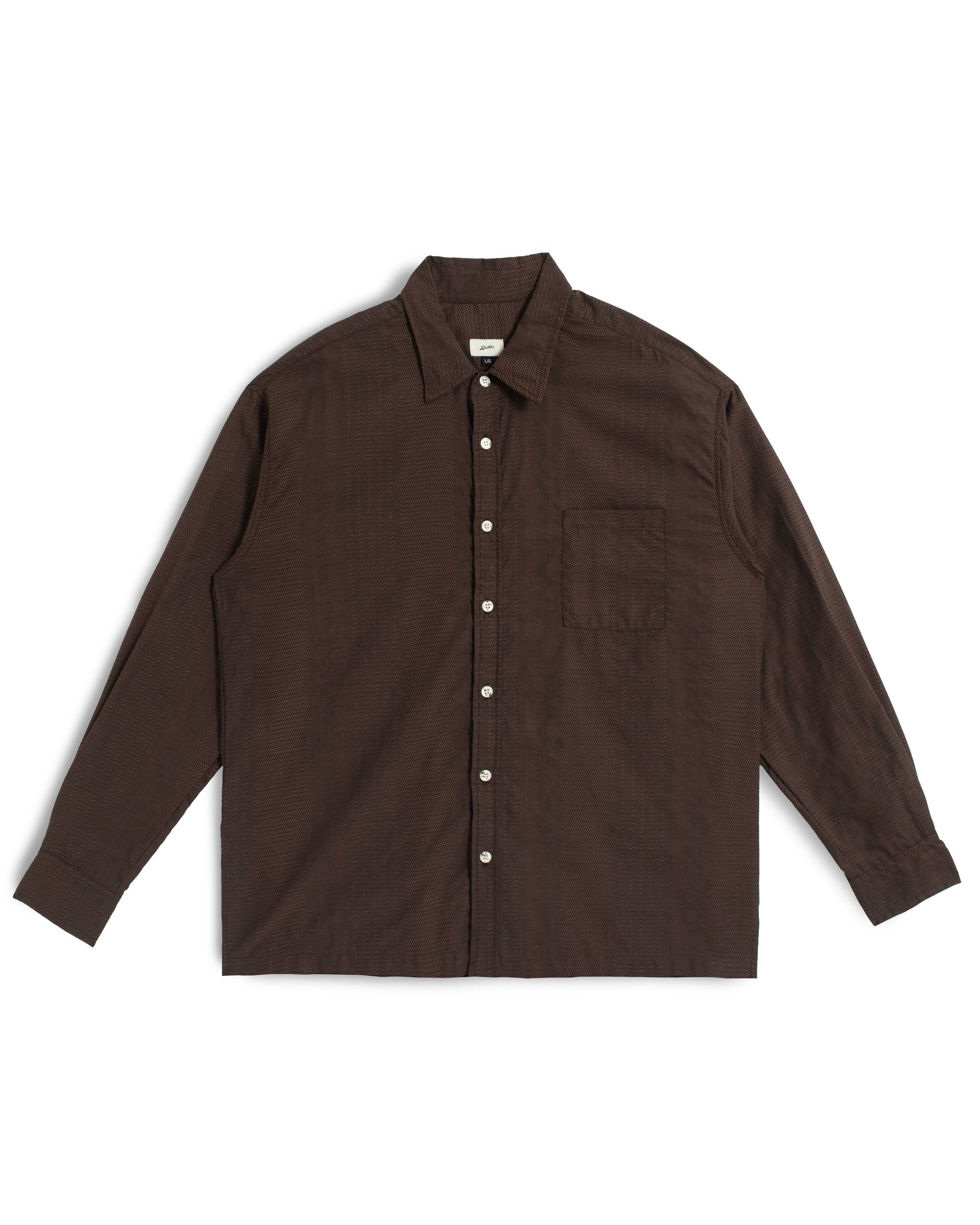 Front view of the Bather Men's Bark Geo Dobby Leisure Shirt, featuring a dark brown Japanese cotton dobby fabric with checkered geometric embroidery, a chest pocket, and a classic collar against a white background.