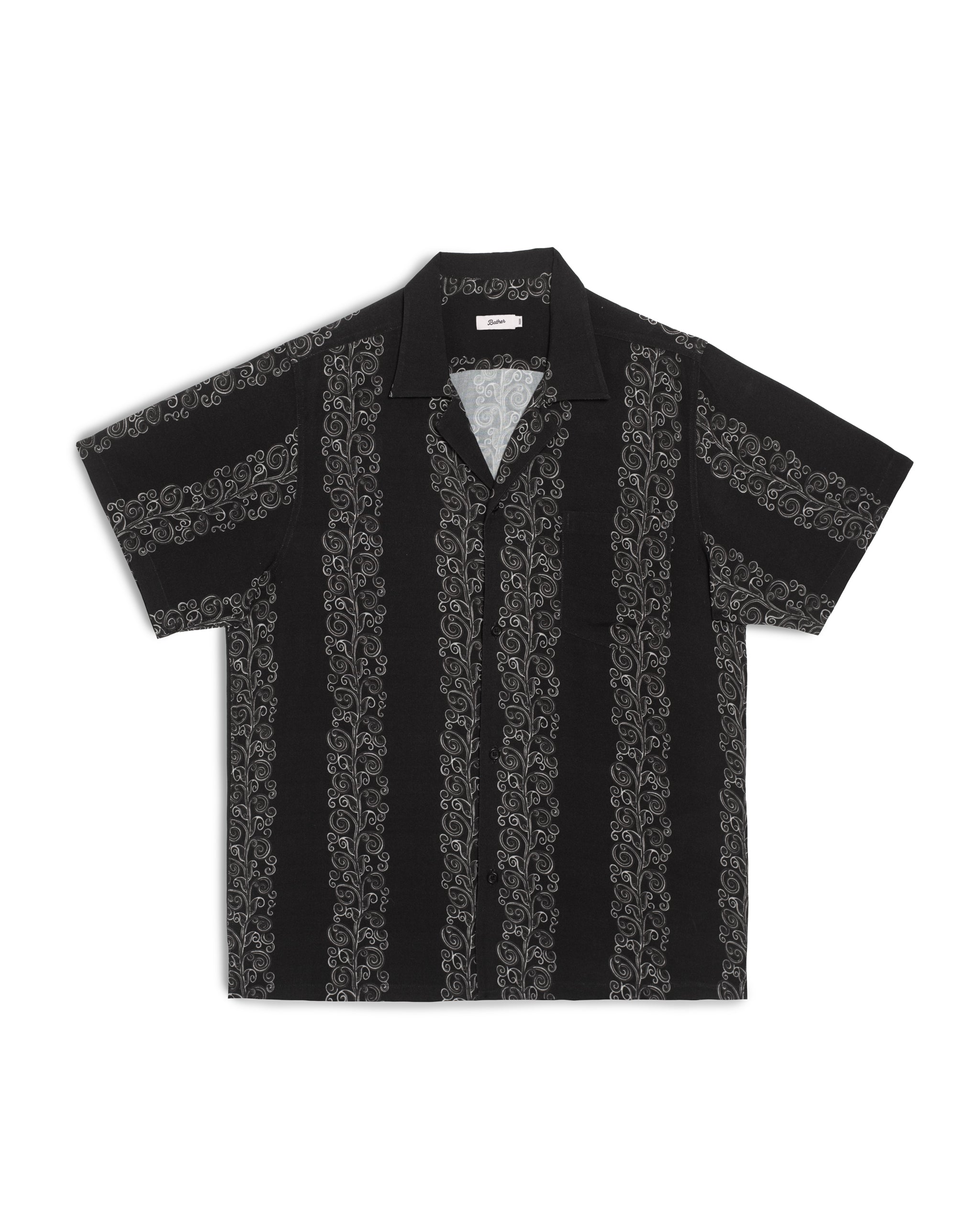 Front view of the Bather Men's Black Fiesta Camp Shirt, featuring a lightweight black rayon fabric with a subtle vertical "Fiesta" stripe pattern, a classic open camp collar, and a single chest pocket against a white background.