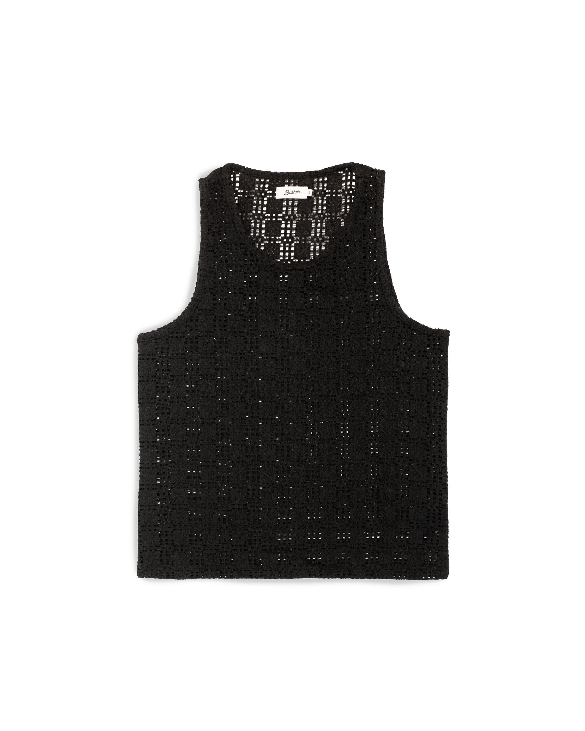 Front view of the Bather Men's Black Lattice Tank Top, featuring a black open-knit lattice lace fabric, a round neckline, and a relaxed, slightly cropped silhouette against a white background.