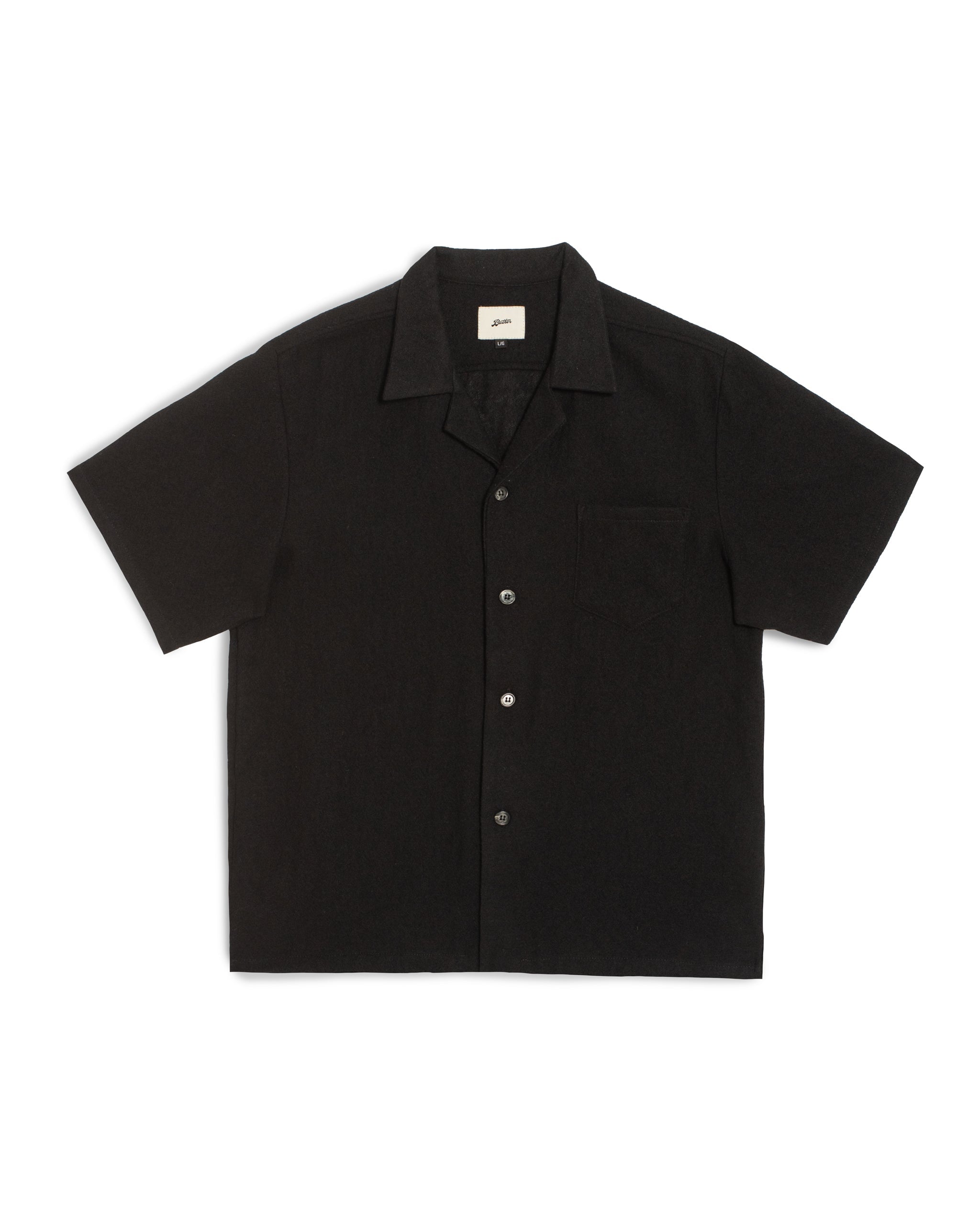Front view of the Bather Men's Black Wool Gauze Camp Shirt, featuring a lightweight 100% Japanese worsted wool gauze fabric, a classic open camp collar, and a single chest pocket against a white background.