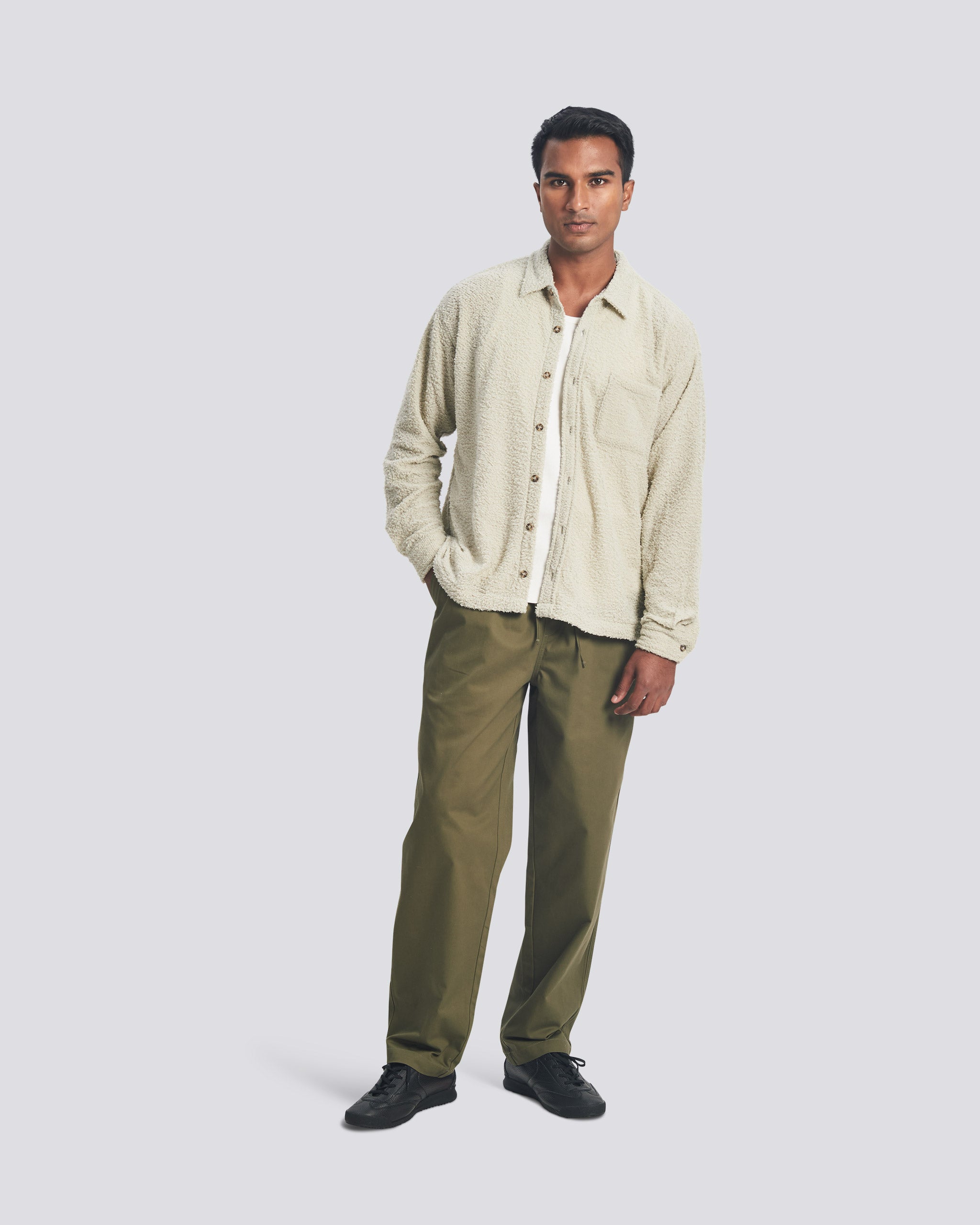 Male model wearing the Bather Men's Cloud Shaggy Leisure Shirt in a relaxed fit, showcasing the unique fuzzy texture and straight hem for a modern casual look.