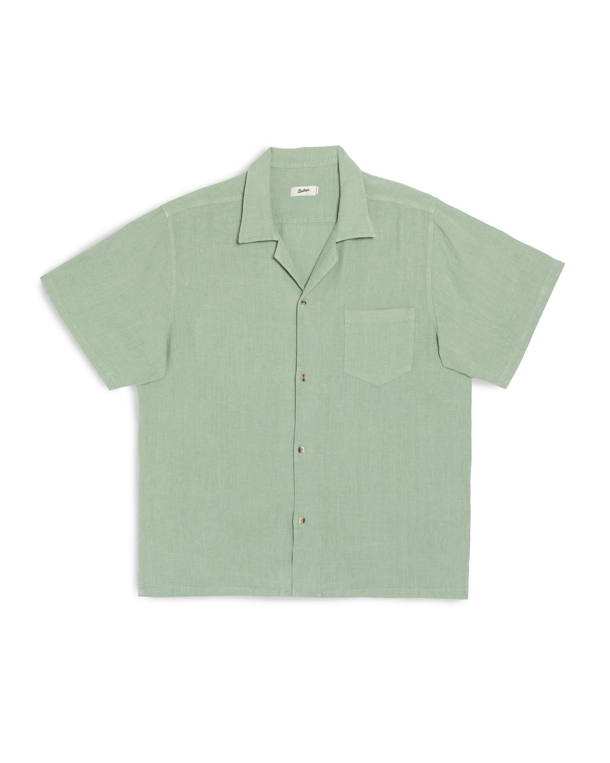 Bather Men's Sage Linen Camp Shirt in light green, featuring a front-facing view of the textured 100% linen fabric, an open camp collar, and a chest pocket on a white background.