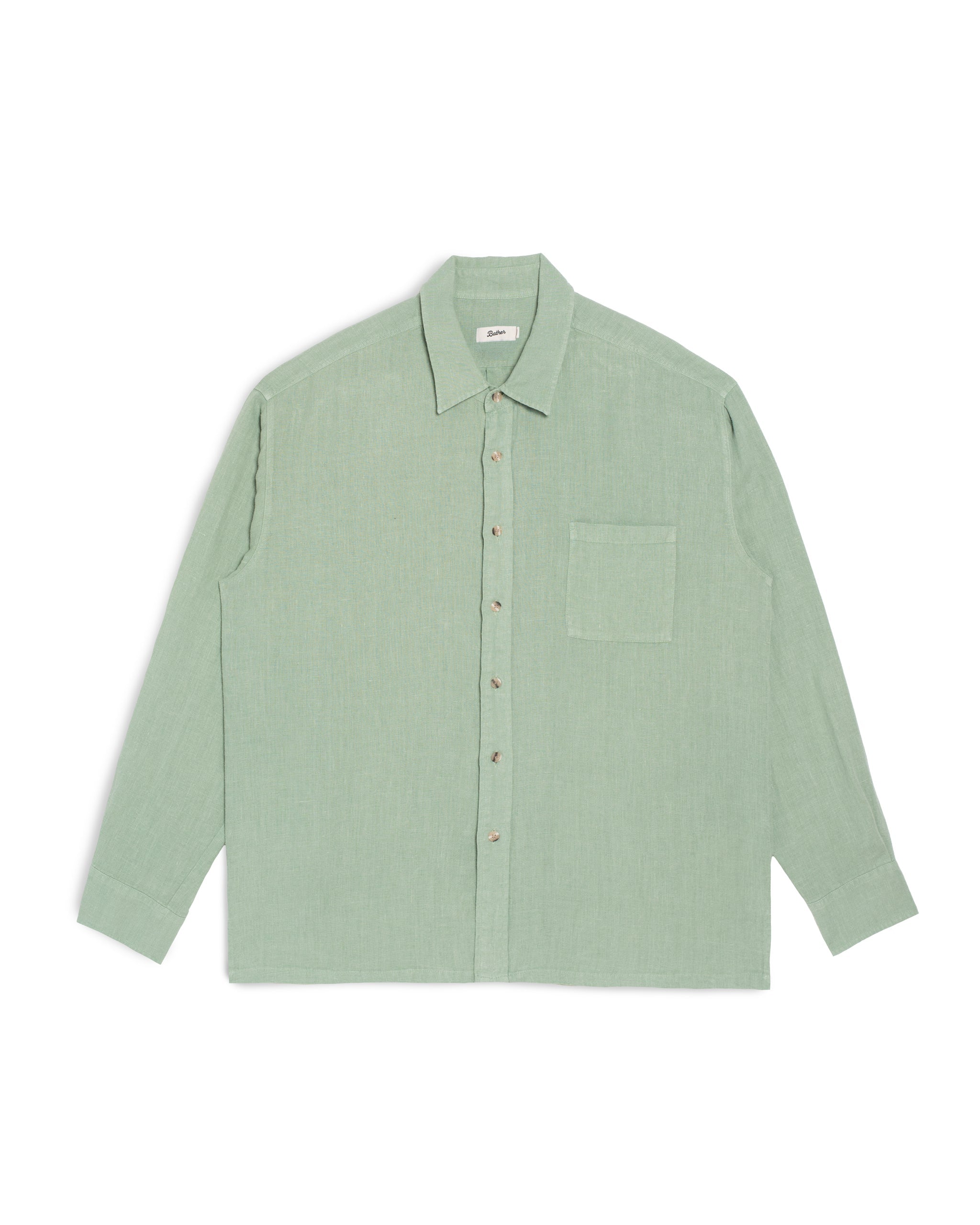 Bather Men's Sage Linen Leisure Shirt in a light green natural tone, featuring a front-facing view of the long-sleeve textured 100% linen fabric, an open collar, and a chest pocket on a white background.