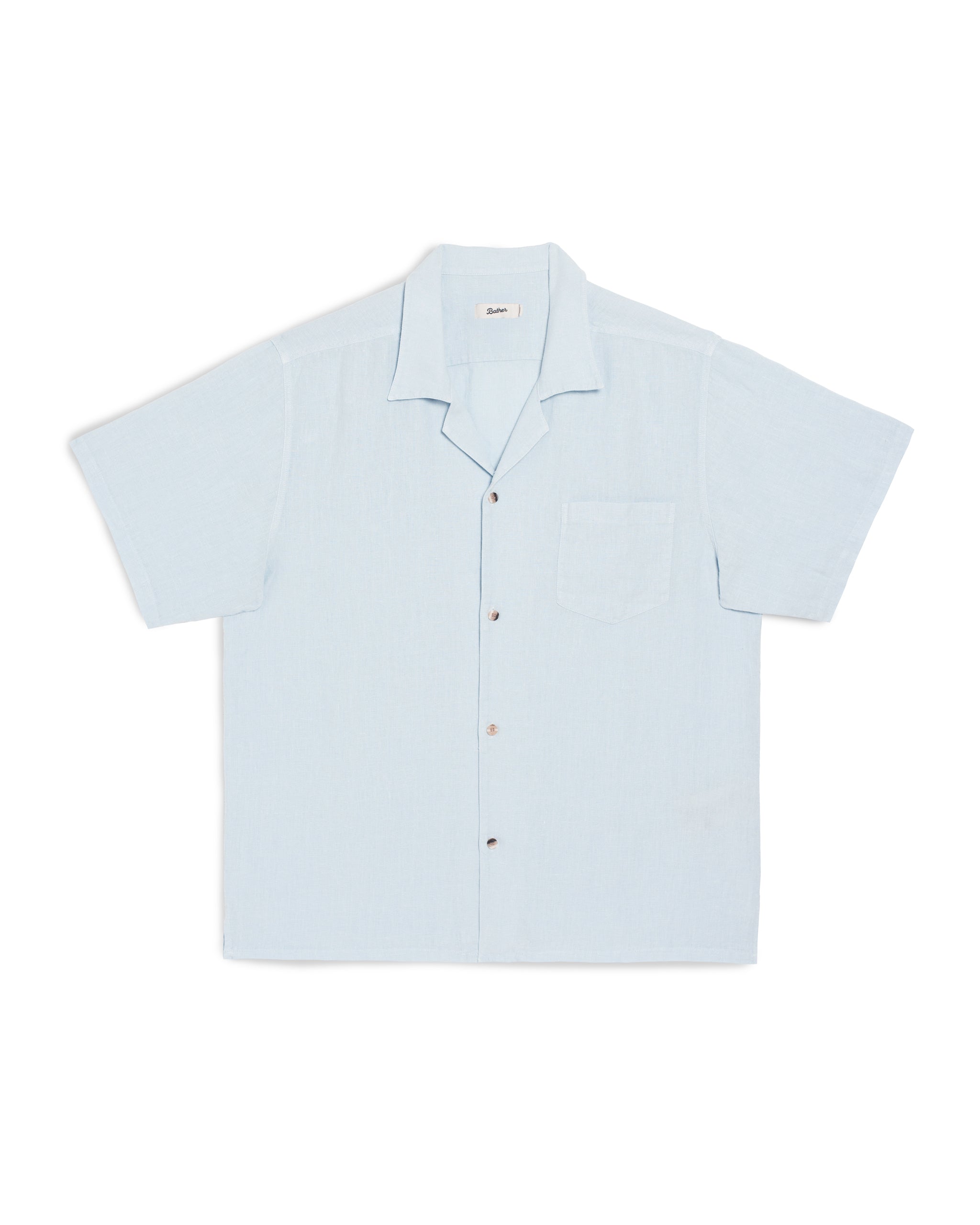 Bather Men's Sky Linen Camp Shirt in a light blue summer shade, featuring a front-facing view of the textured 100% linen fabric, an open camp collar, and a chest pocket on a white background.