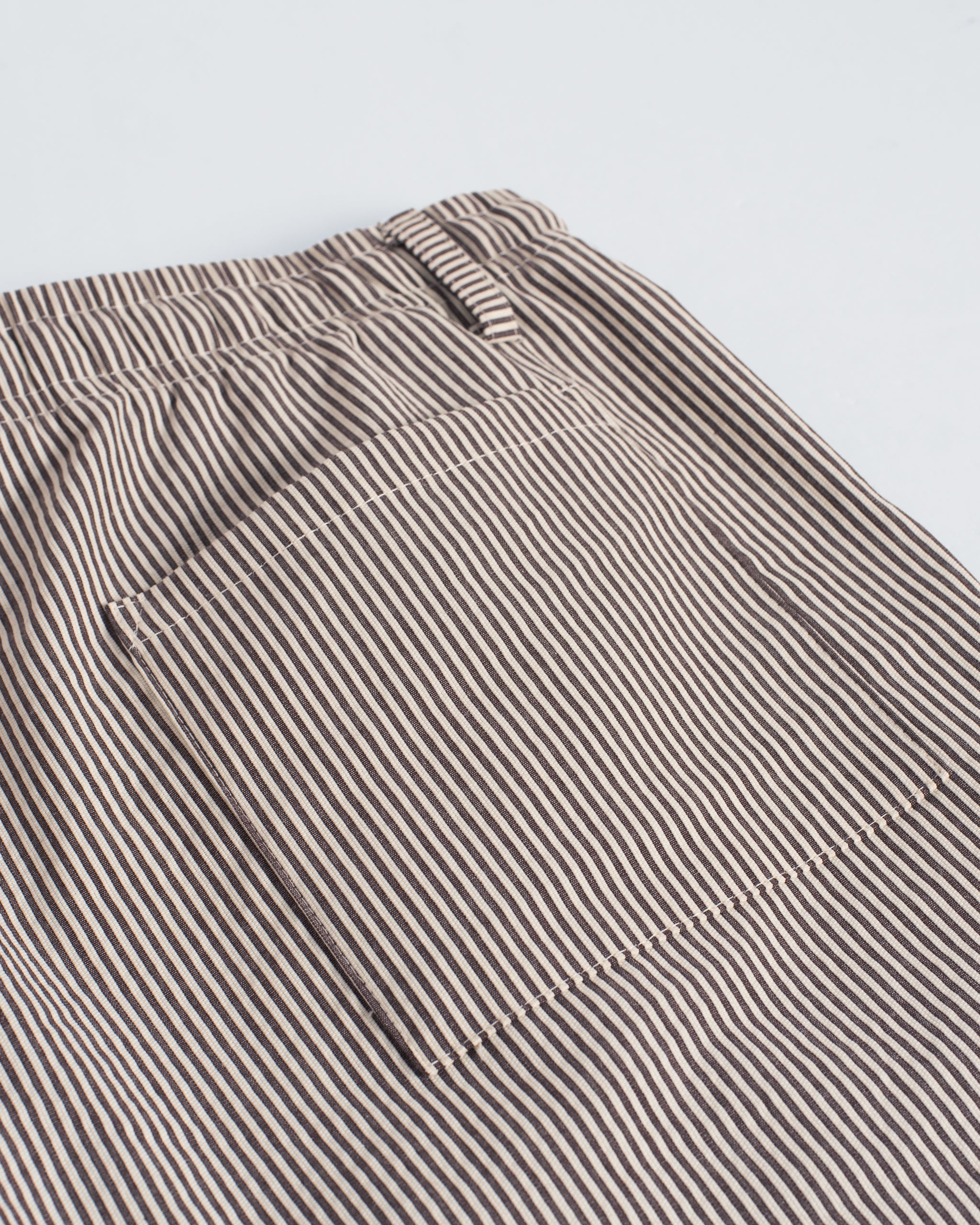 Closeup of back pocket on Bather men's brown pinstripe pant