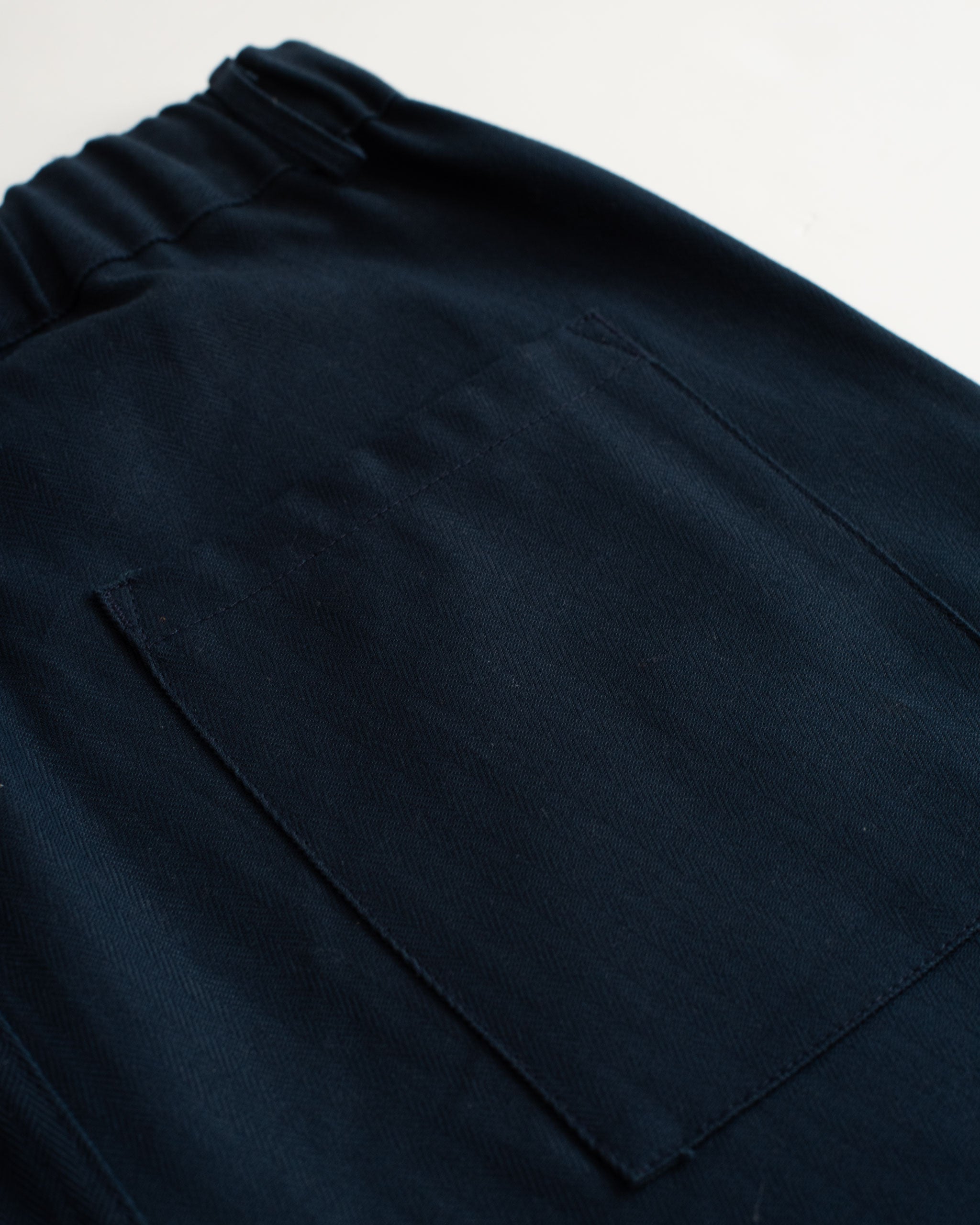 Back pocket shot of Bather men's Solid Navy Herringbone Leisure Shorts