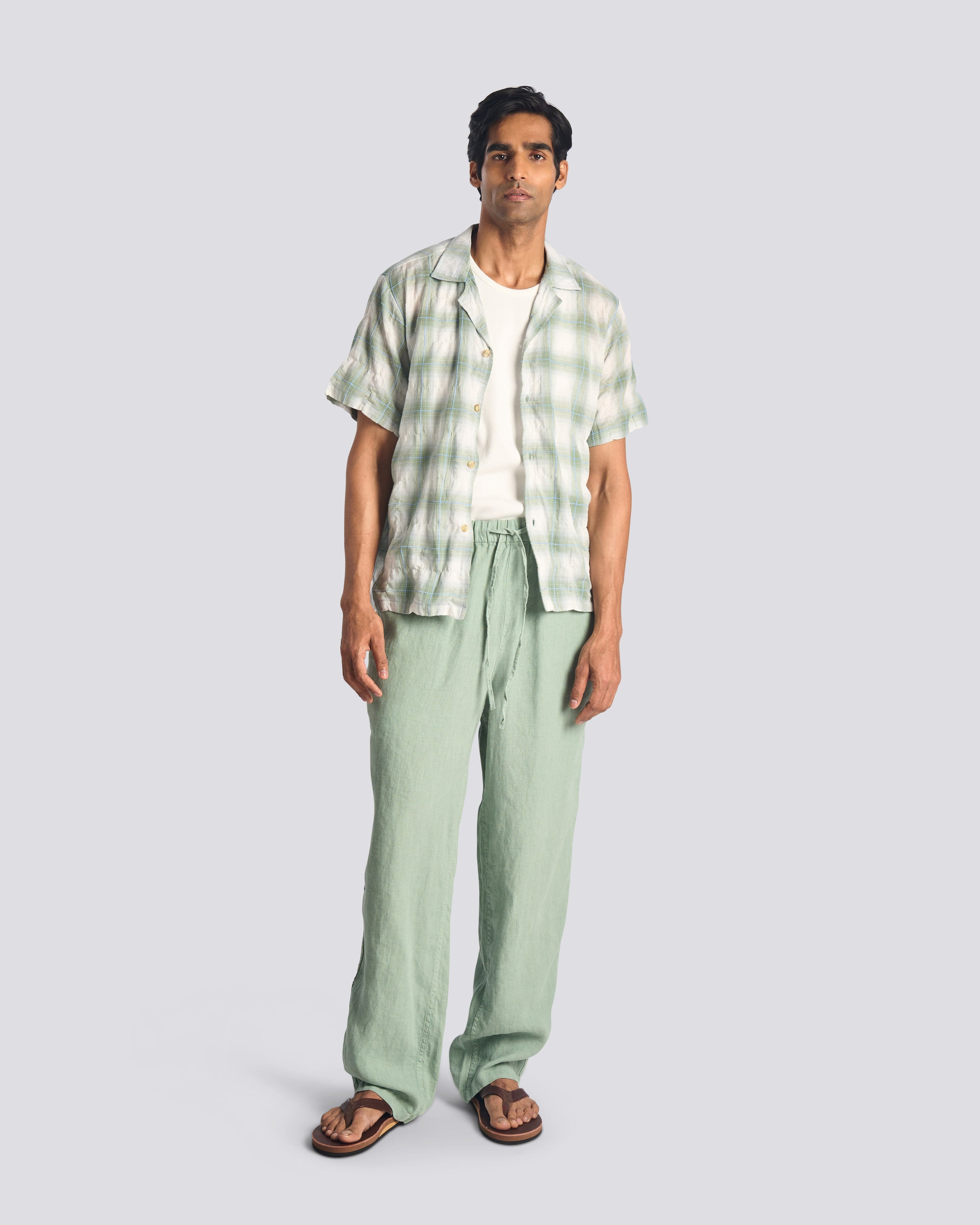 Model wearing Bather men's light green drawstring linen pants