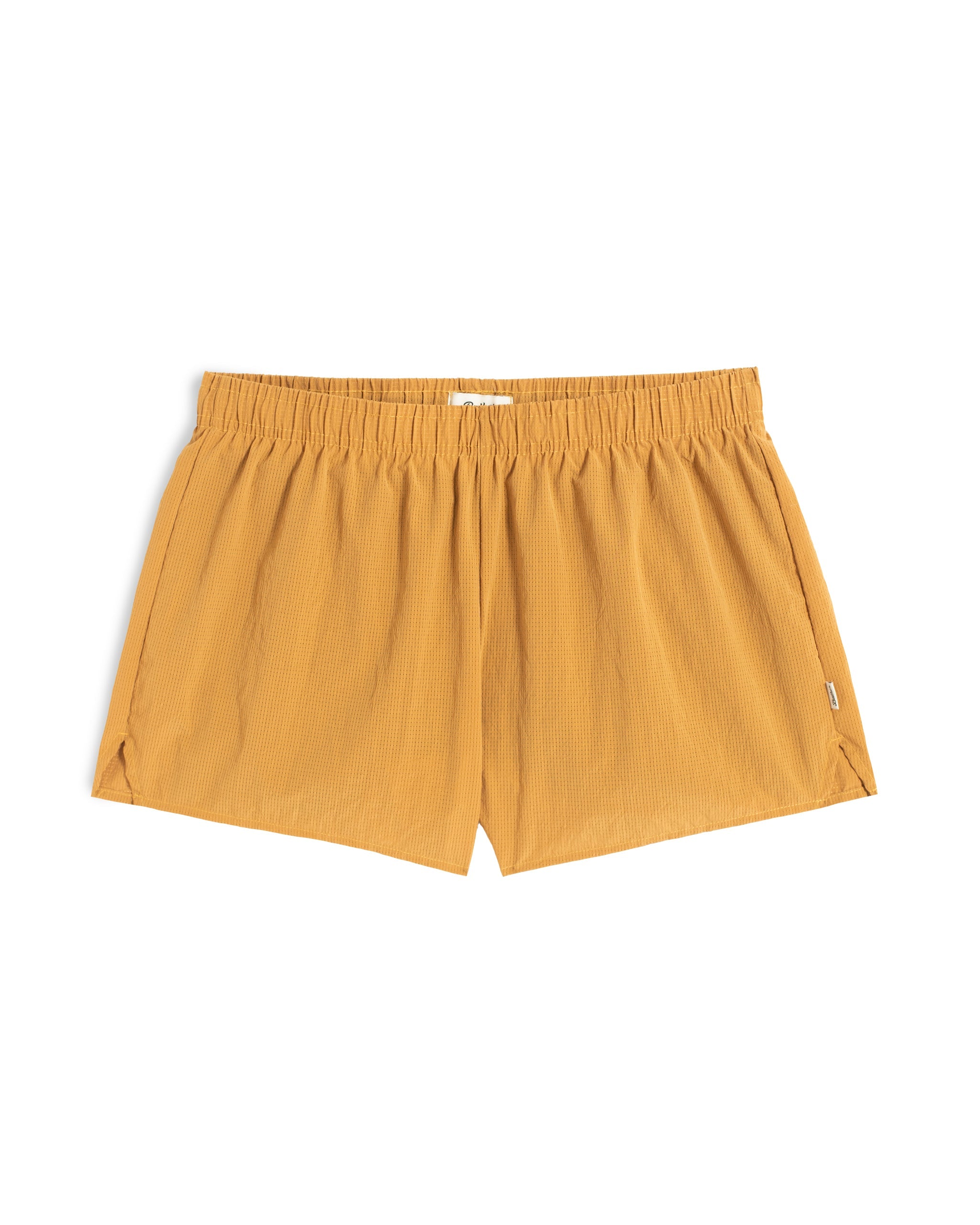 Front view of 3.5 inch inseam Bather Active Trunk in yellow featuring lightweight recycled Japanese DotAir nylon with stretch fabric and compression liner