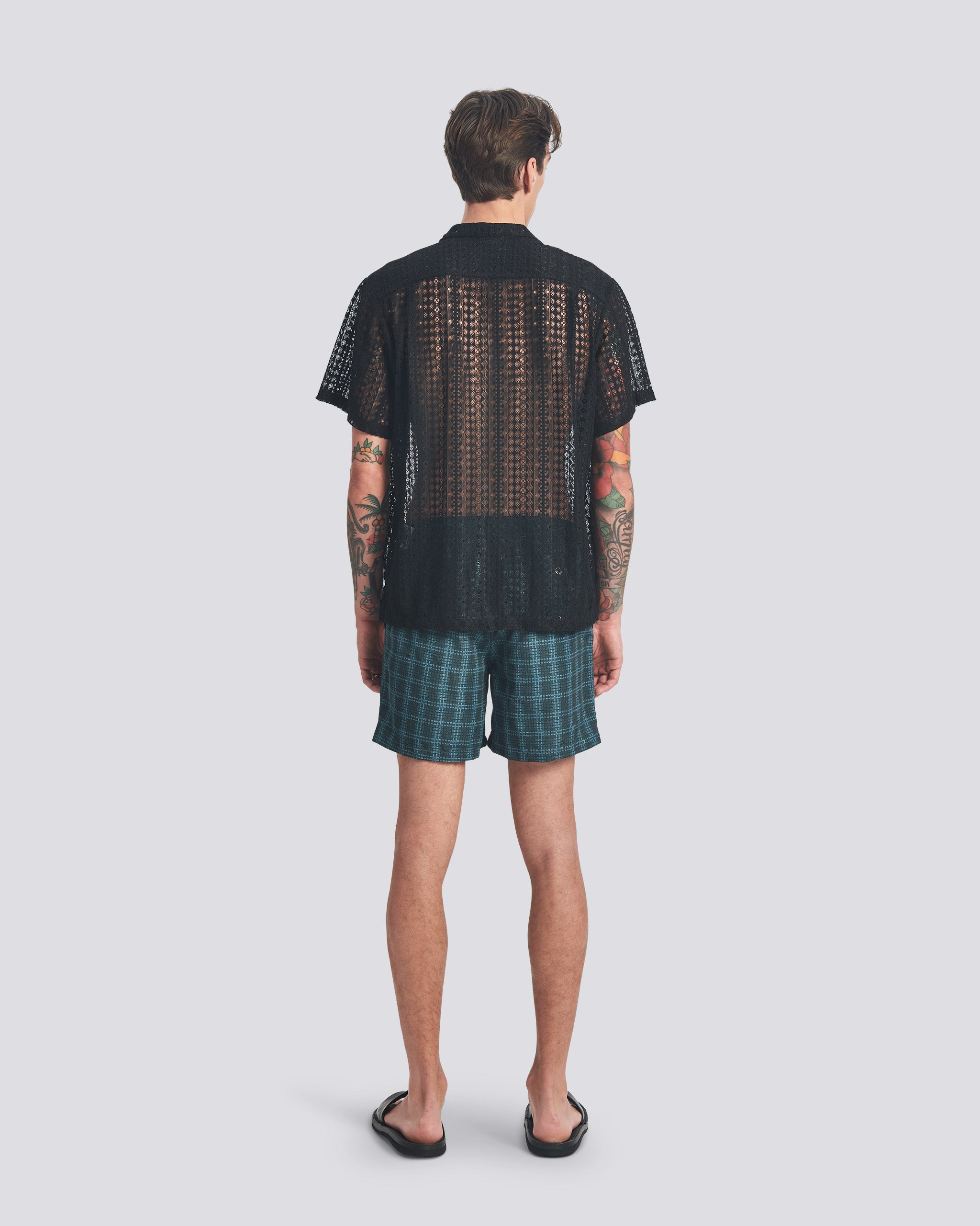 Black textured shirt lace shirt on a white background