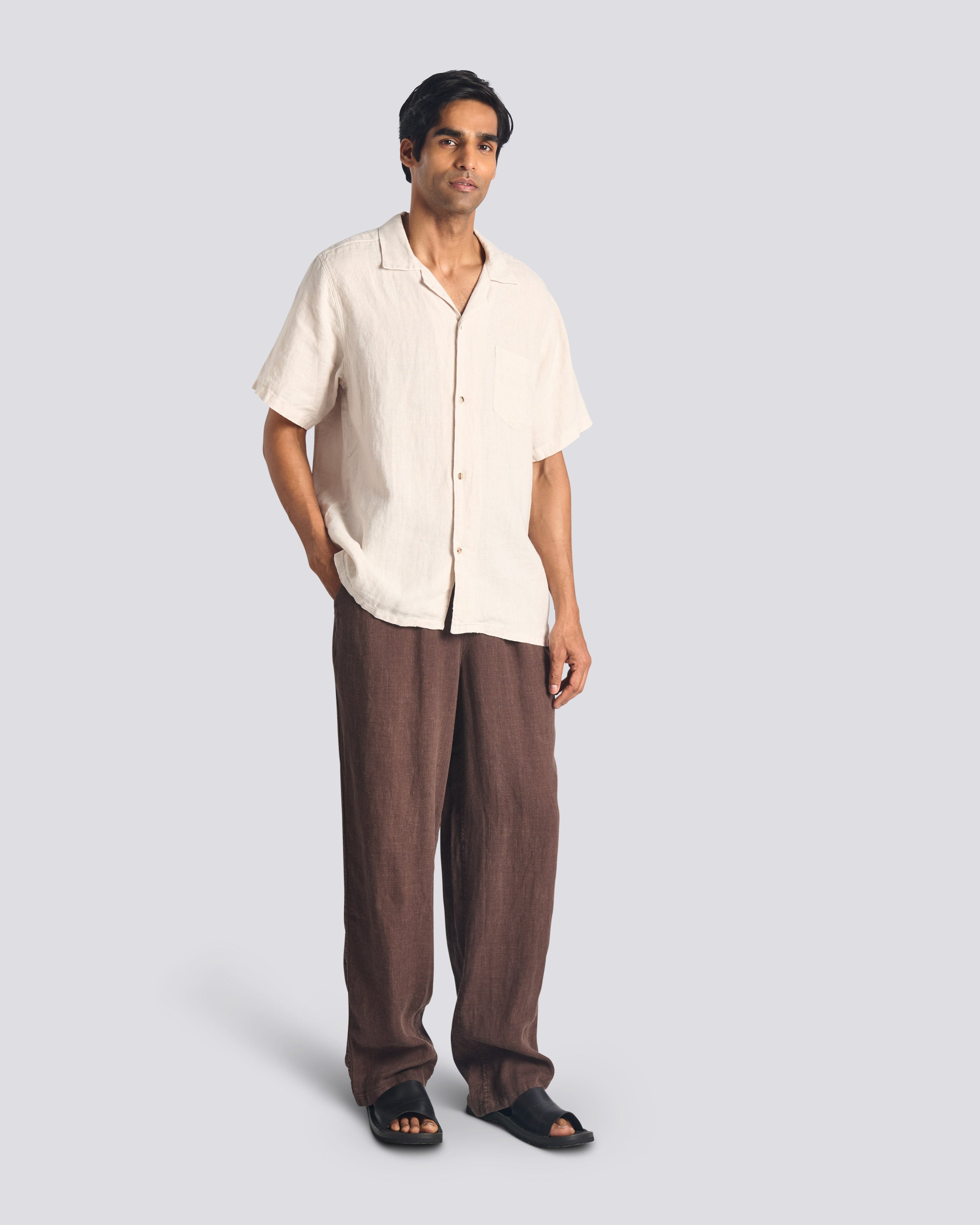 Model wearing Bather men's dark brown linen pant