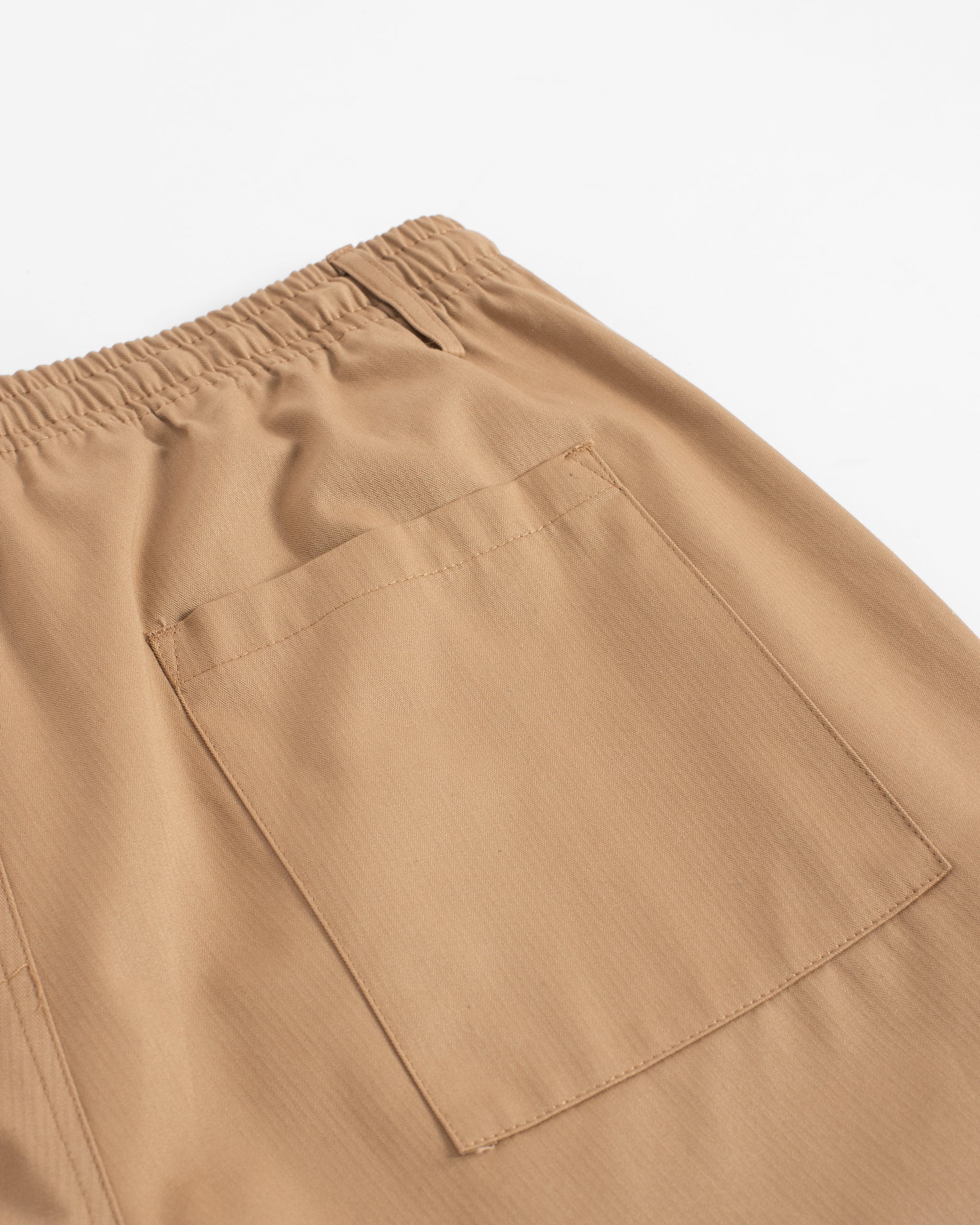 Closeup pocket detail of Bather men's khaki pant