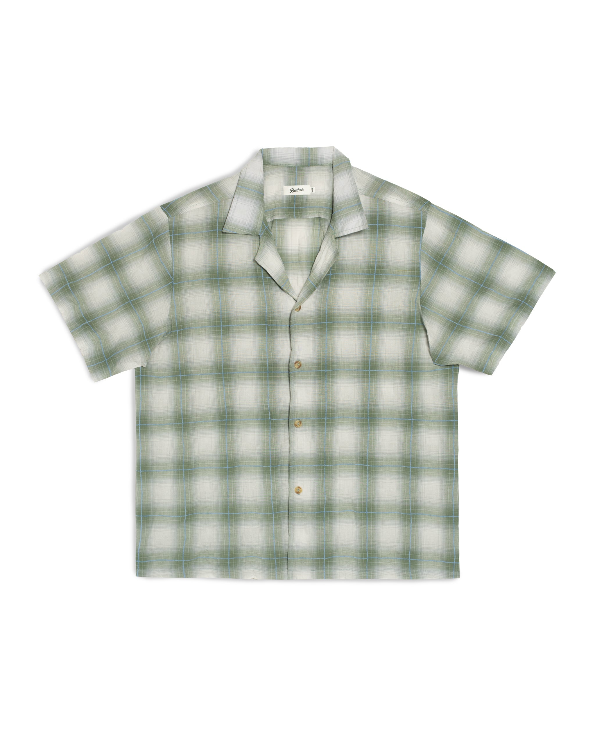 Green and white checkered shirt on a white background