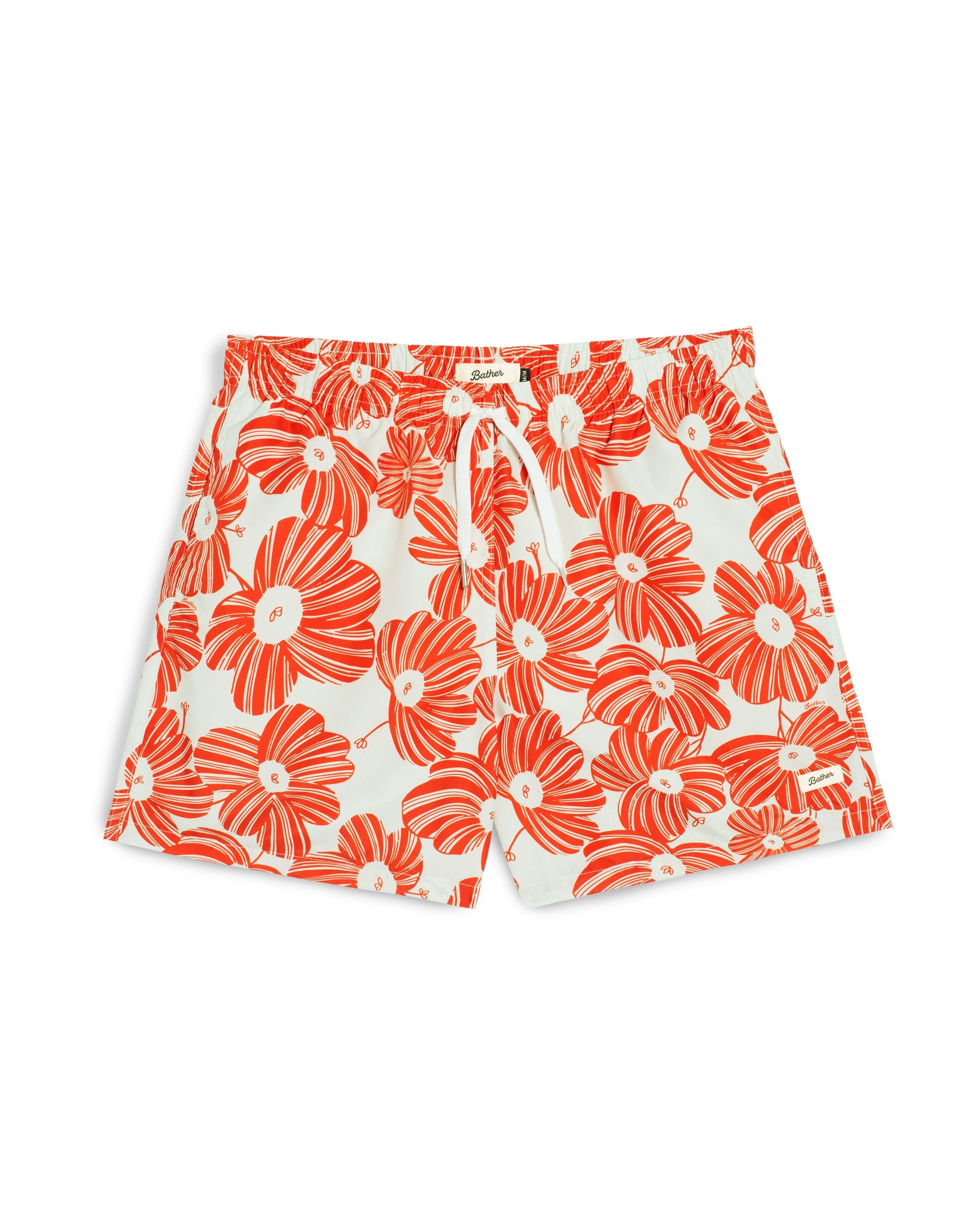 Red floral patterned shorts on a white background