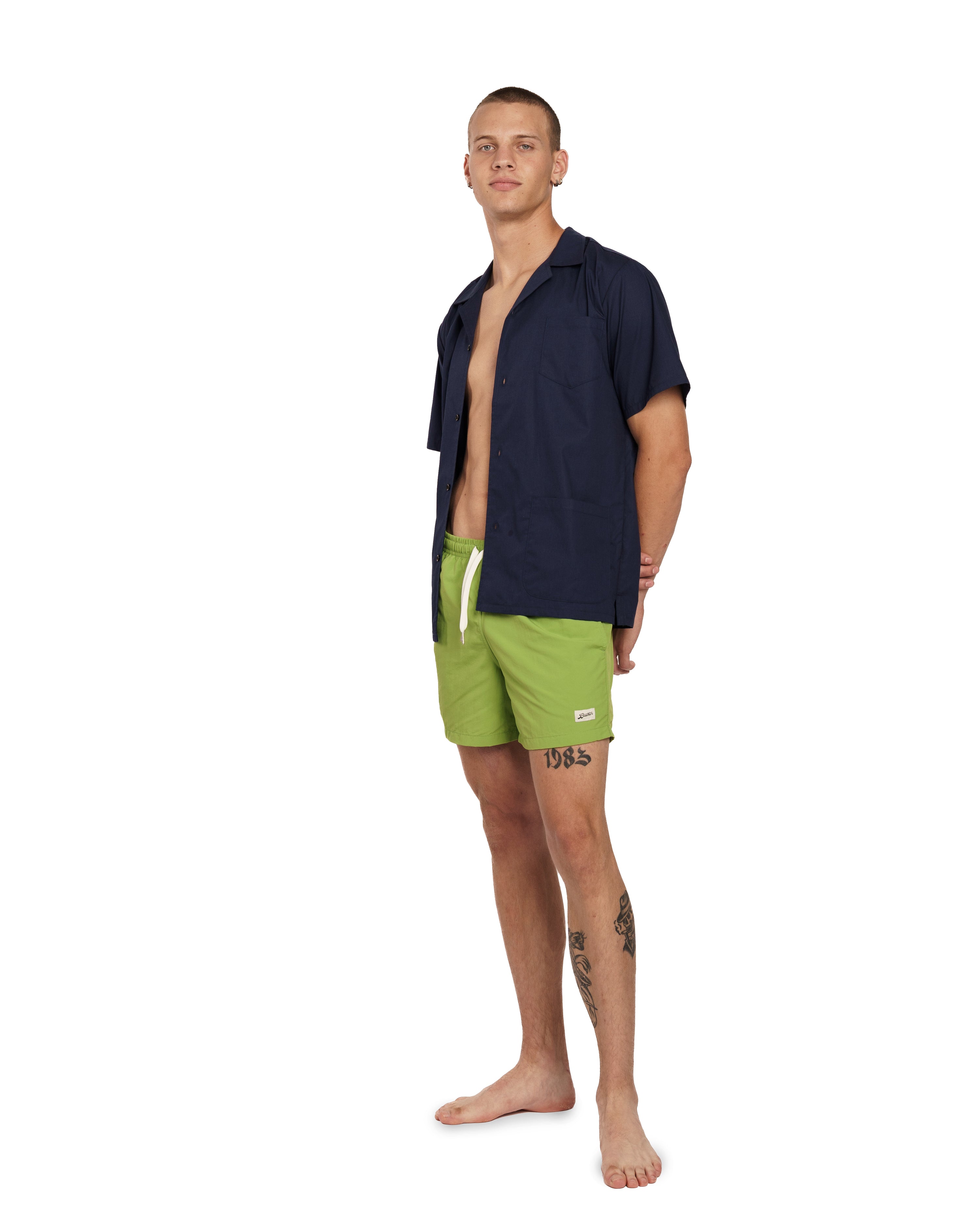 kiwi green Bather swim trunk on model