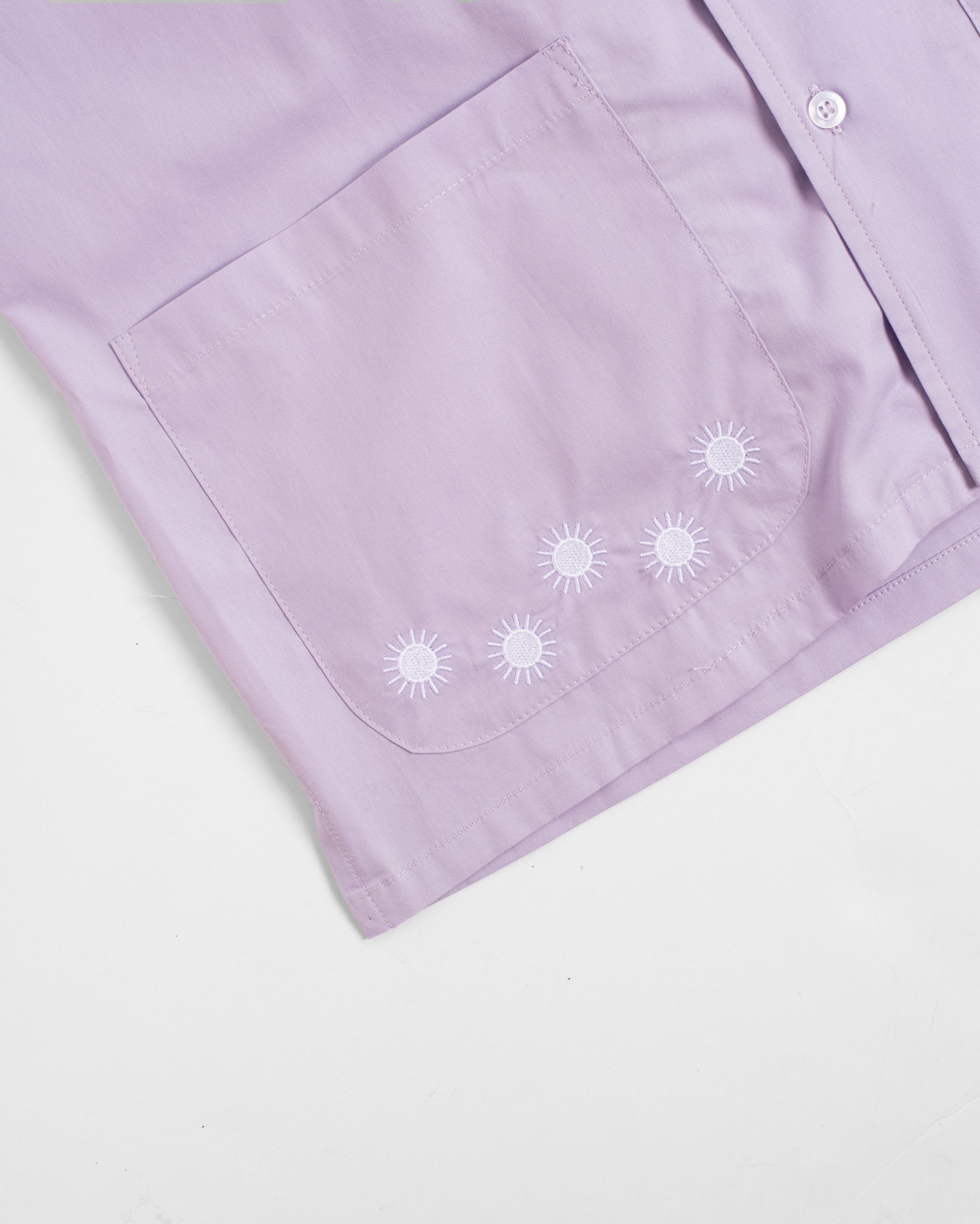 Lavender embroidered sun camp shirt close up