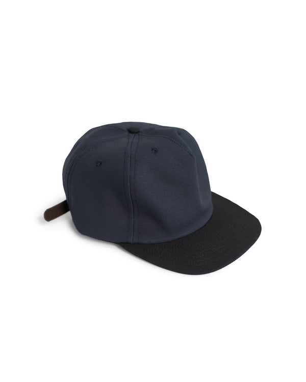 Bather hat with black brim and navy blue panels