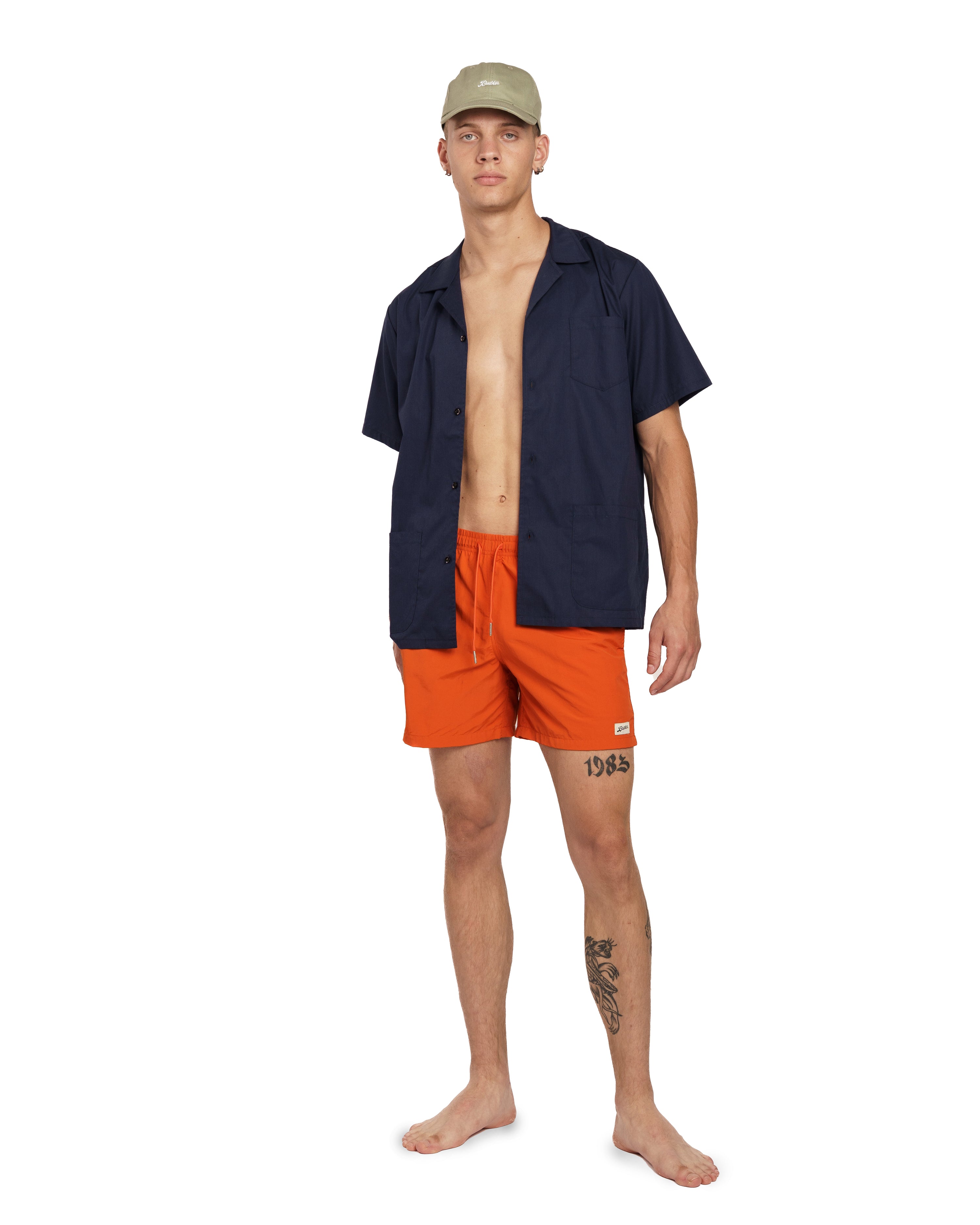 Solid Orange Swim Trunk on model