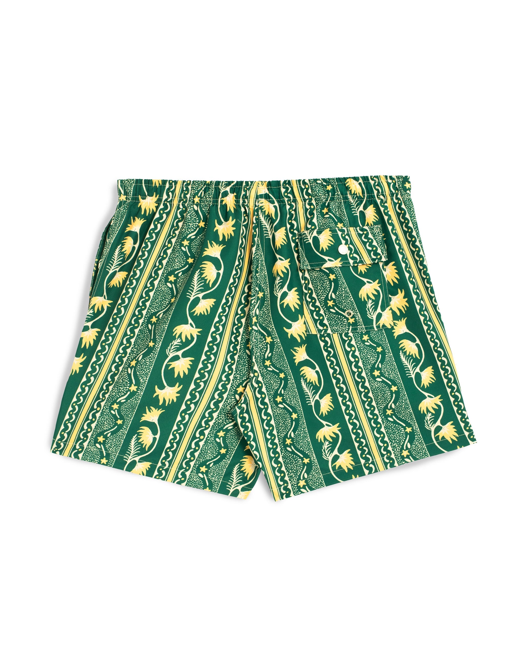 back shot of Green swim trunk with yellow and white classic stripe features intricate mosaics of flowers, sand, and starfish