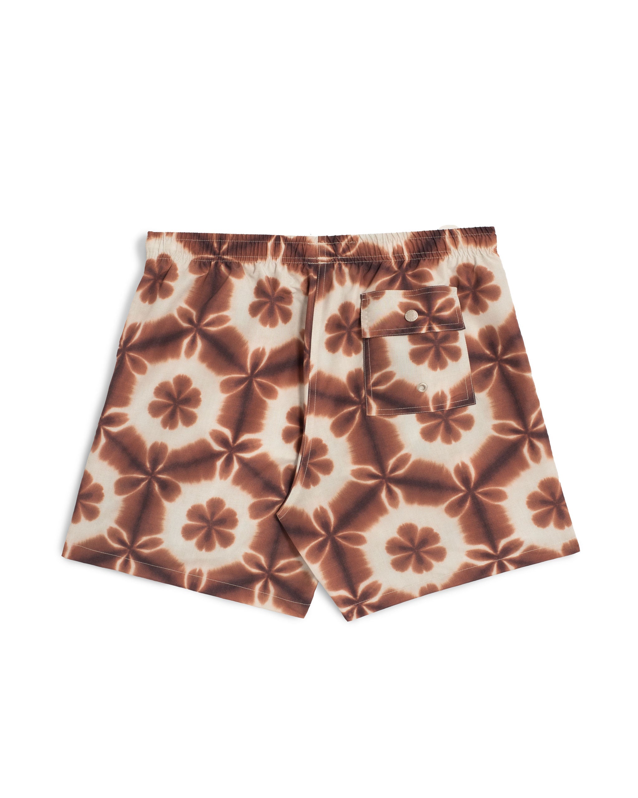 back shot of Brown swim trunk with a shibori-inspired print that looks like a kaleidoscope pattern