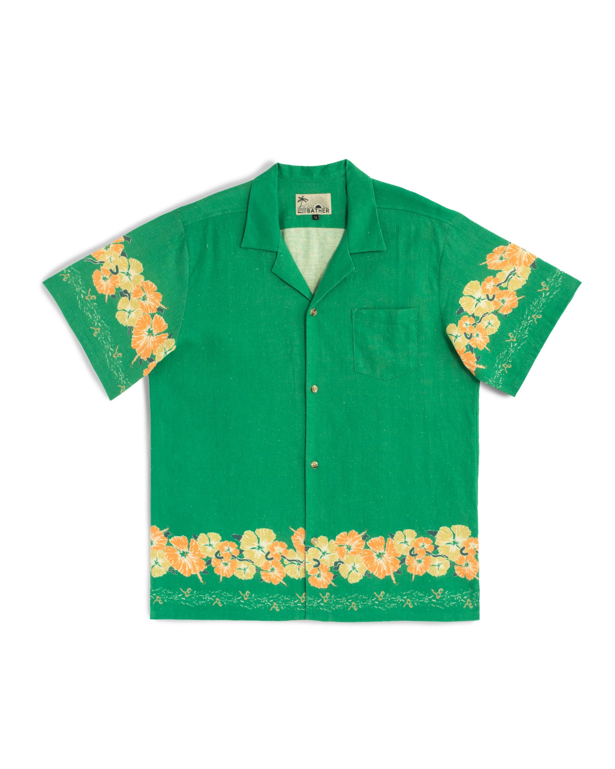 Green camp shirt with floral motif pattern on the sleeves and bottom hem