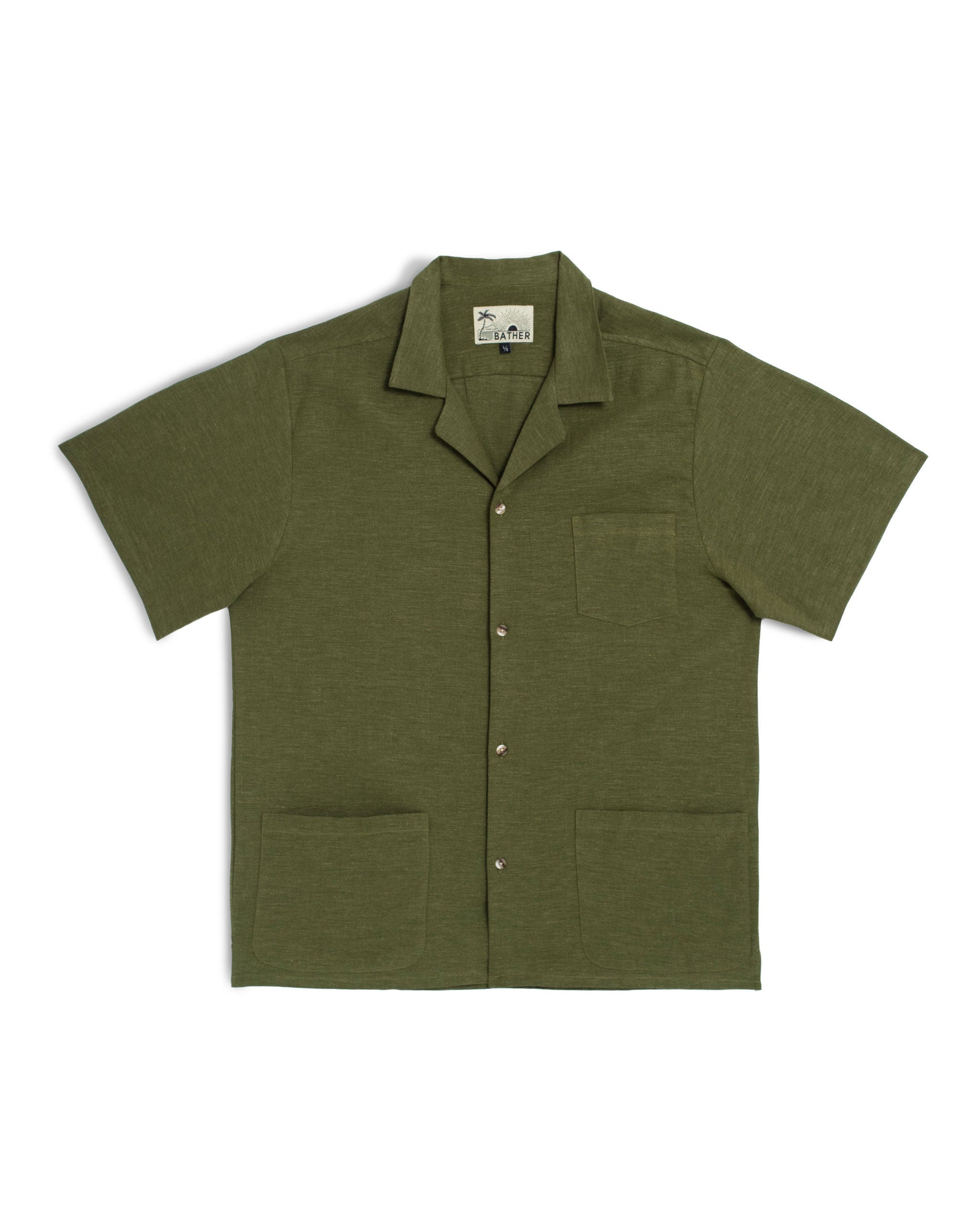 An olive green linen camp shirt with a chest pocket and two lower pockets on the front