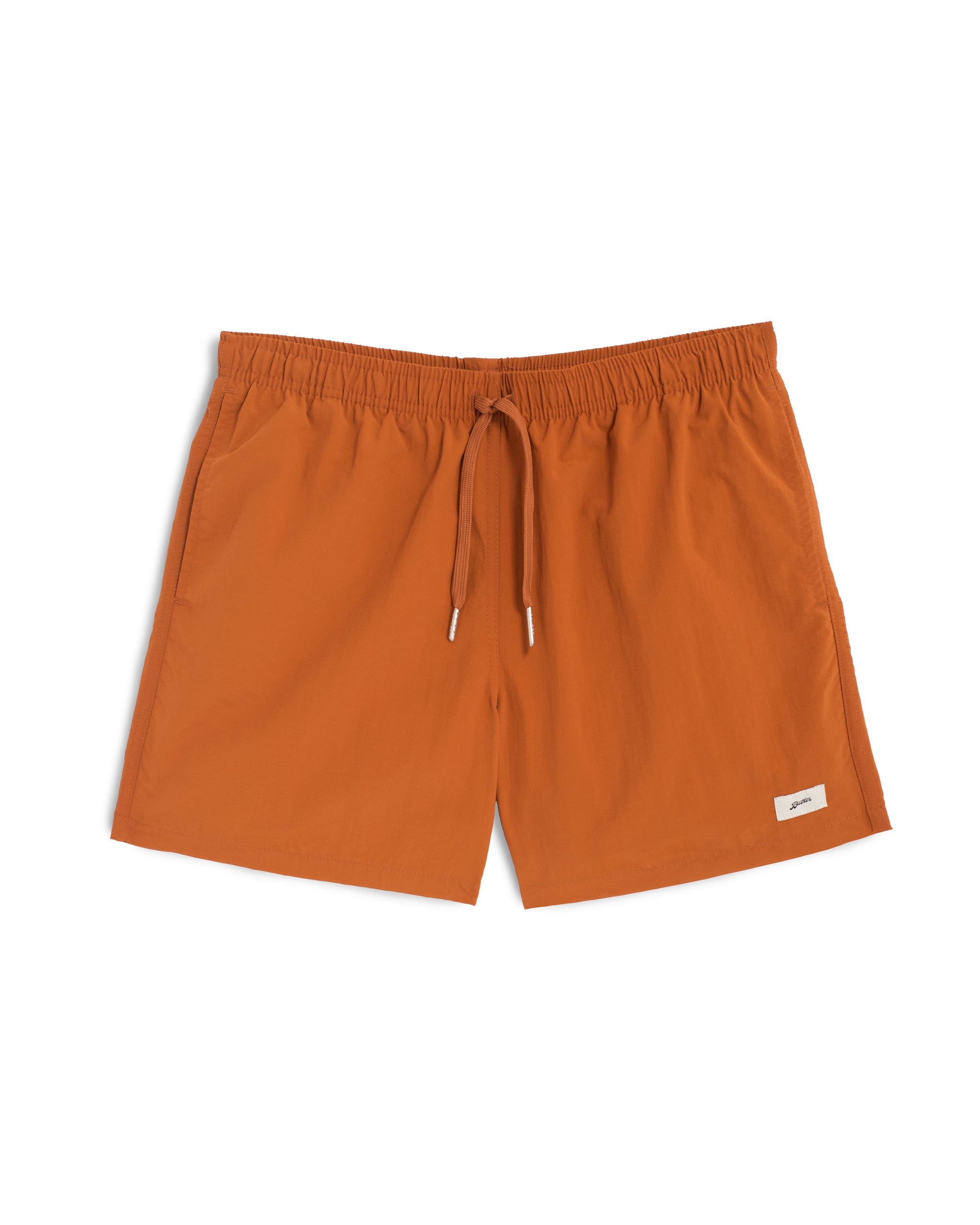 A solid orange swim trunk in ginger orange with a matching drawstring