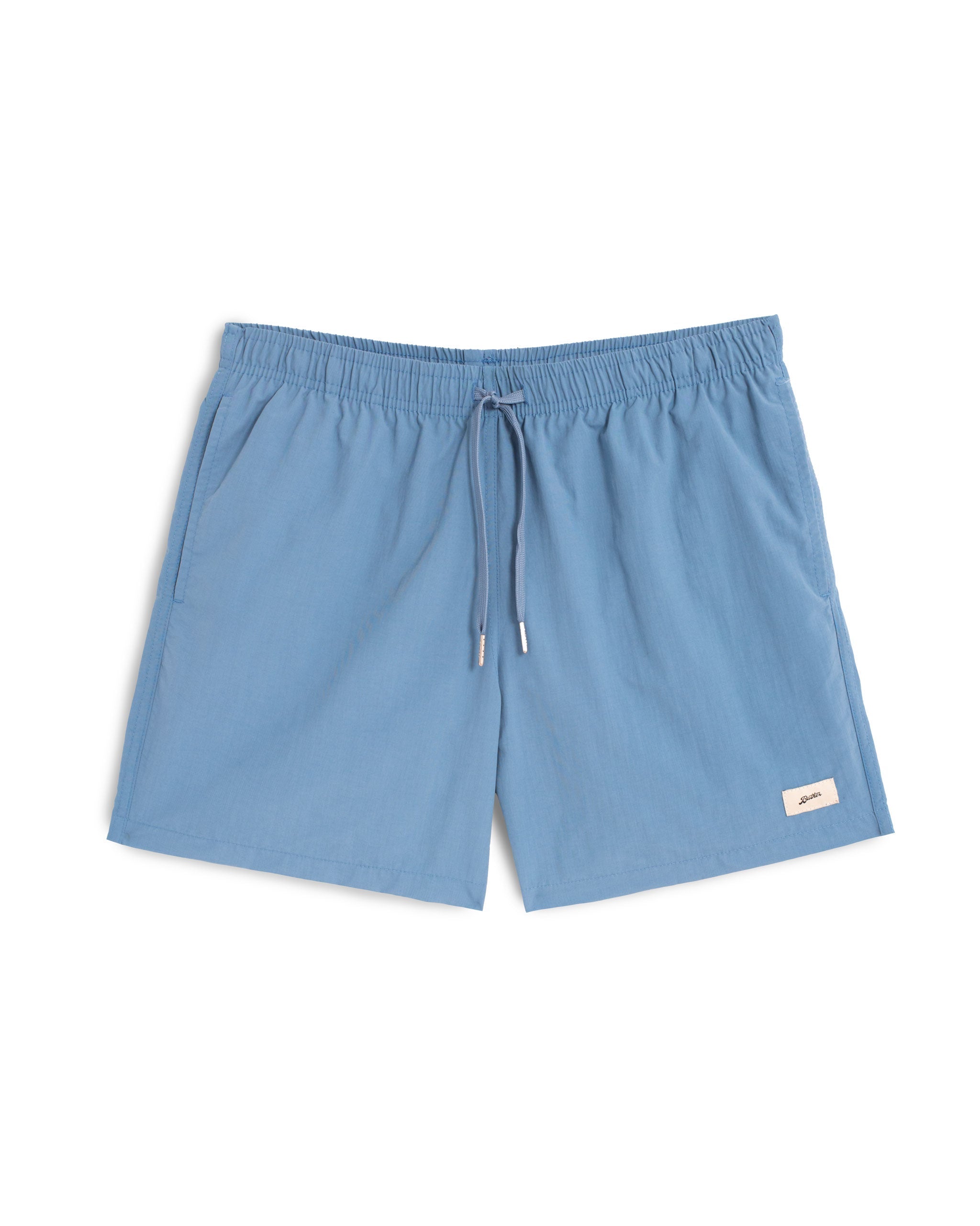 A solid blue swim trunk with matching drawstring