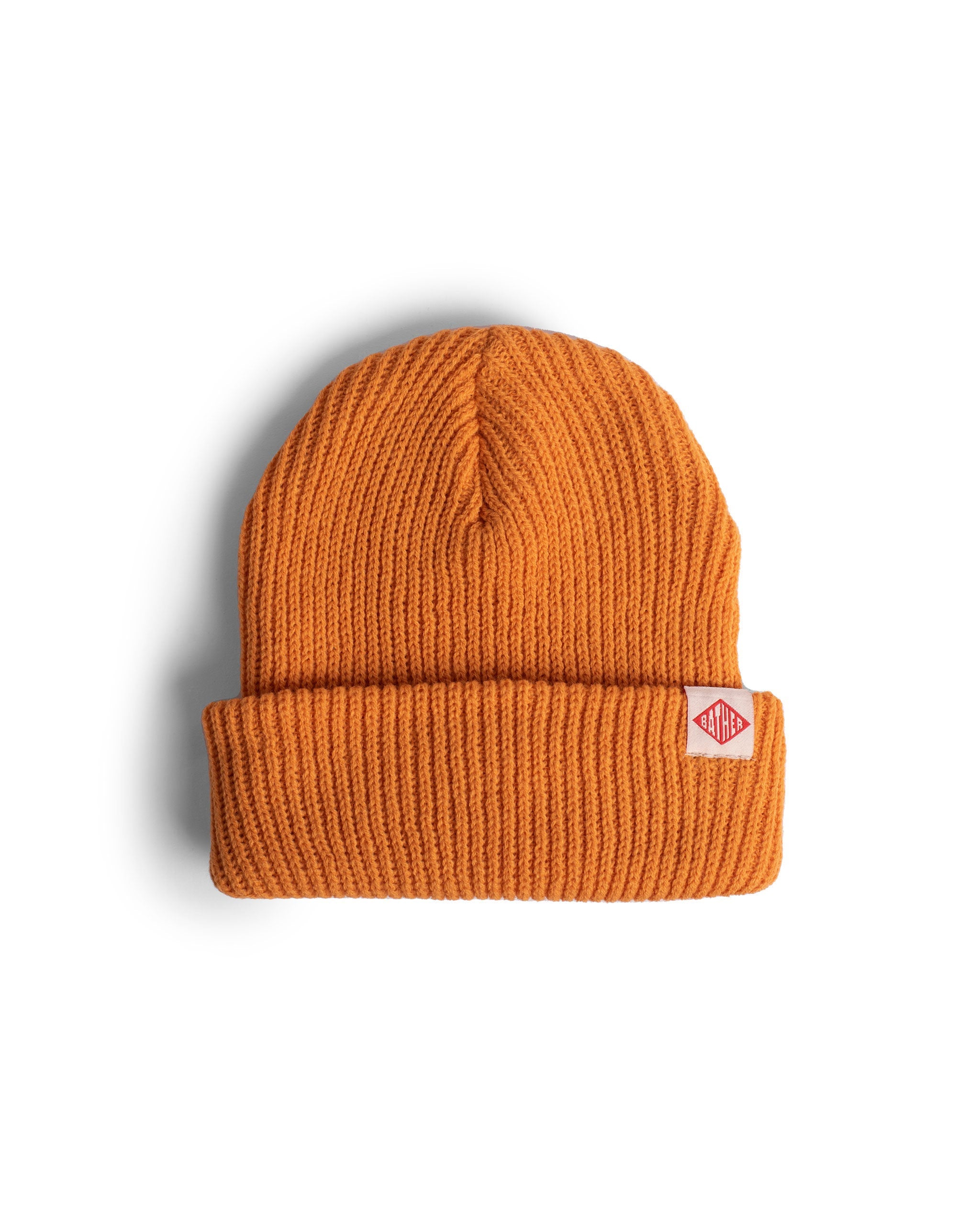 Orange bather beanie with brand tag 