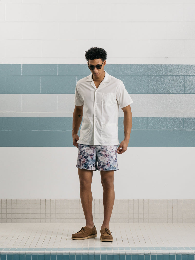 Model wearing white Bather camp shirt with pockets