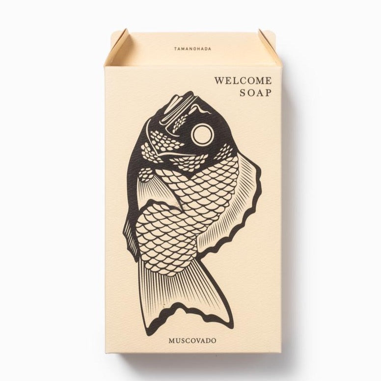 Cream packaging for fish-shaped soap sold on Bather