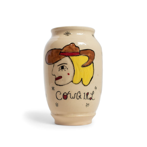 image of ceramic vase with hand painted cowgirl. handmade by Daniel Dooreck